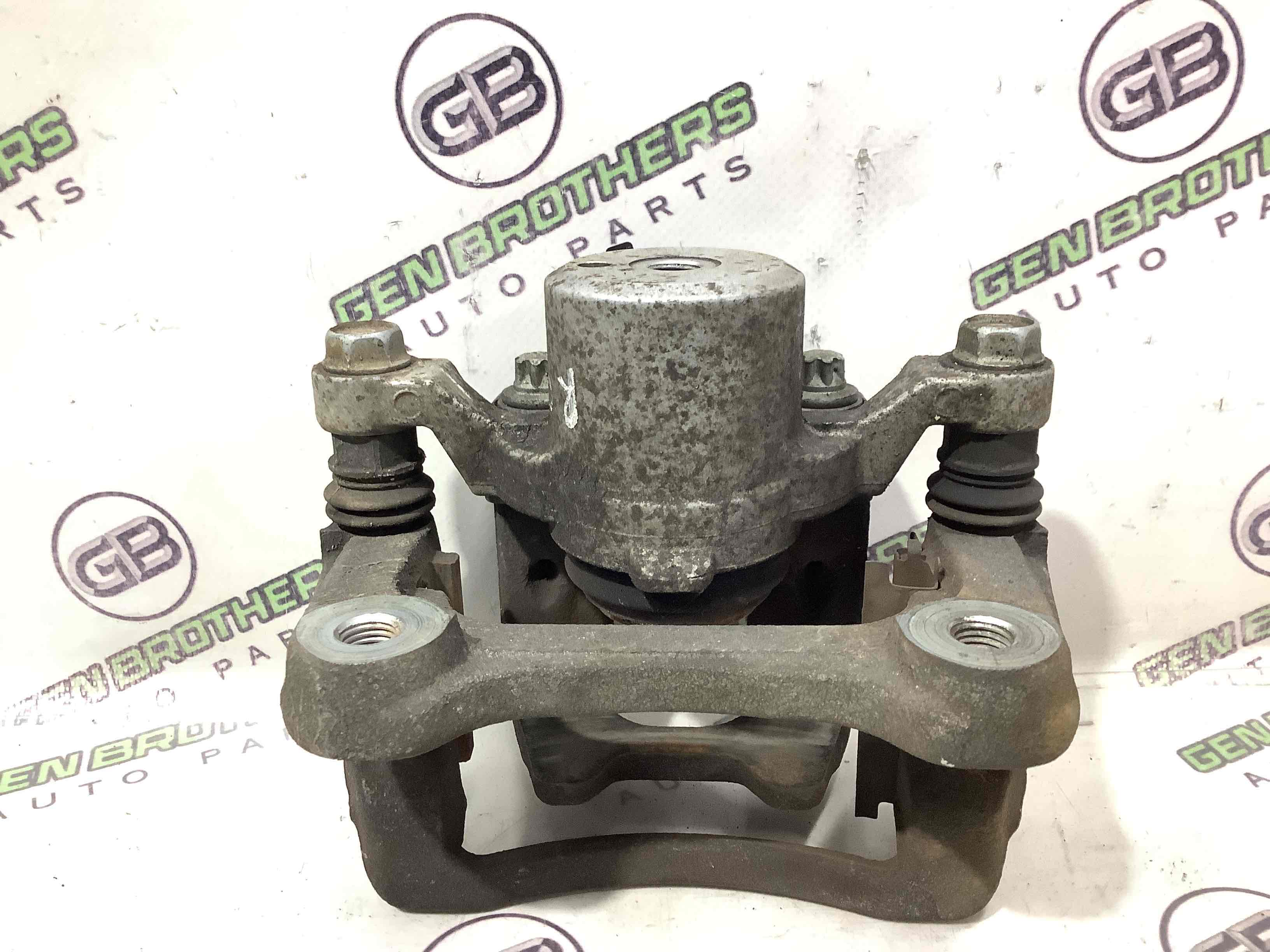 Супорт задній правий