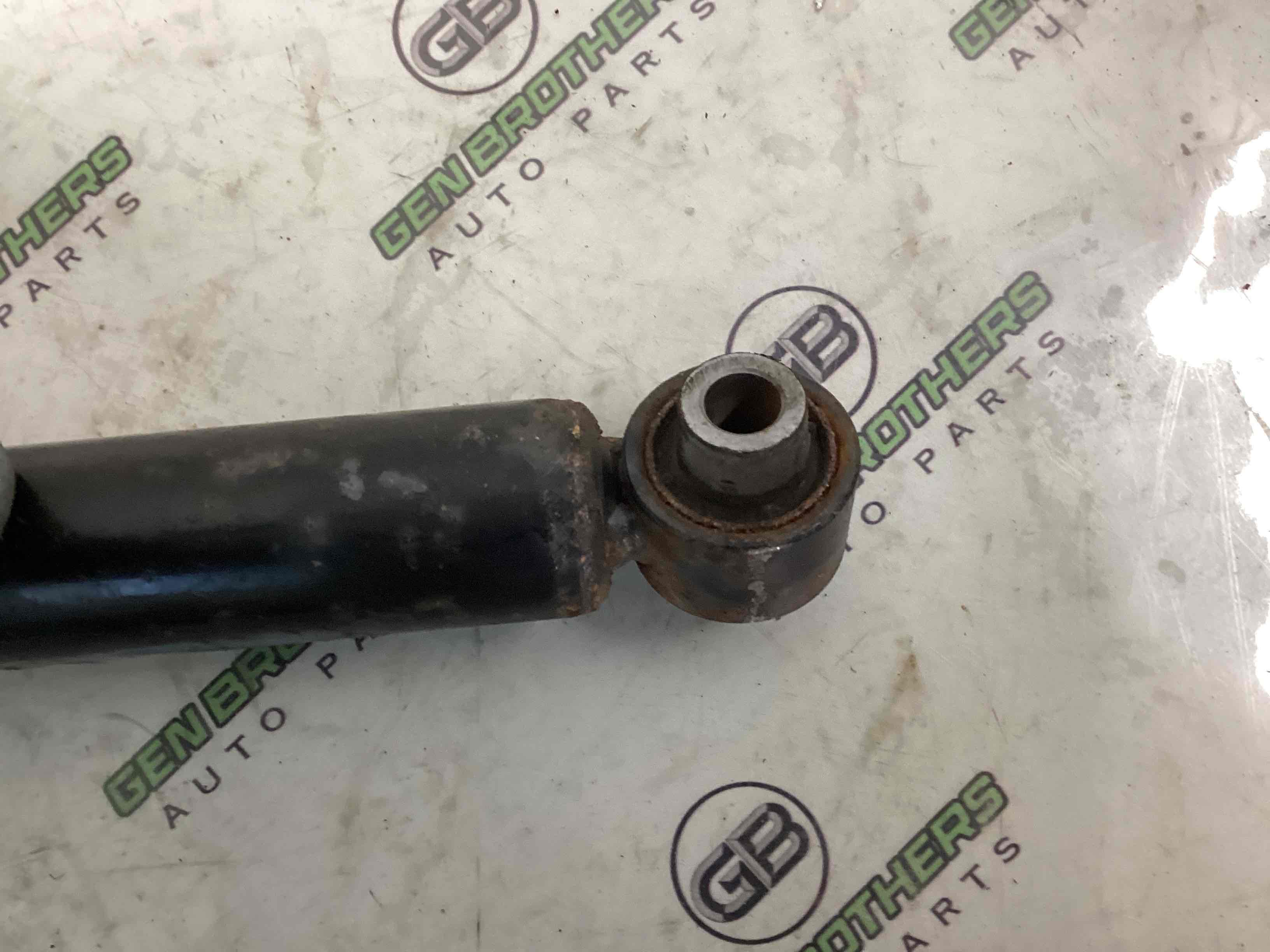 Амортизатор задній правий