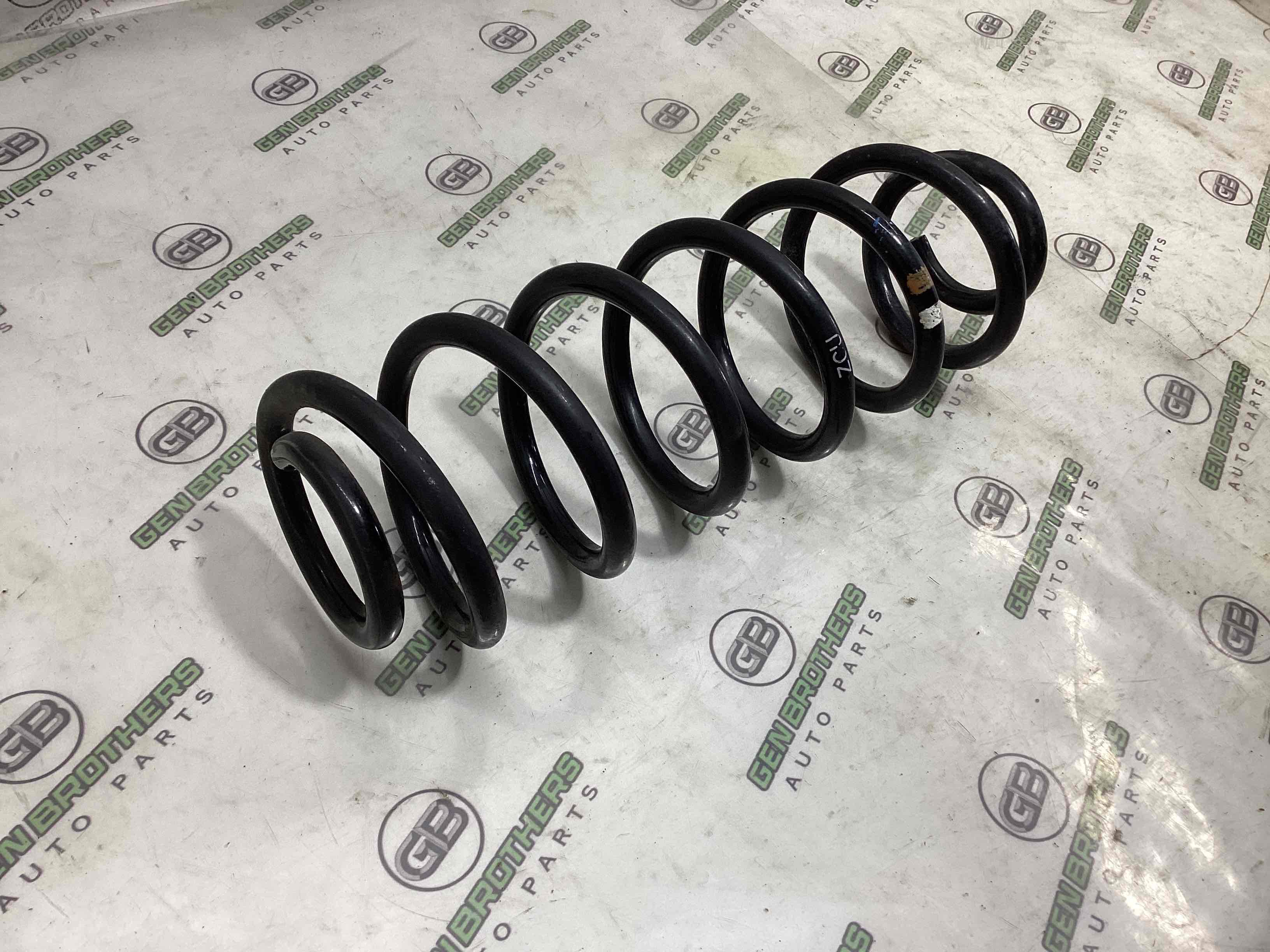 Пружина задня