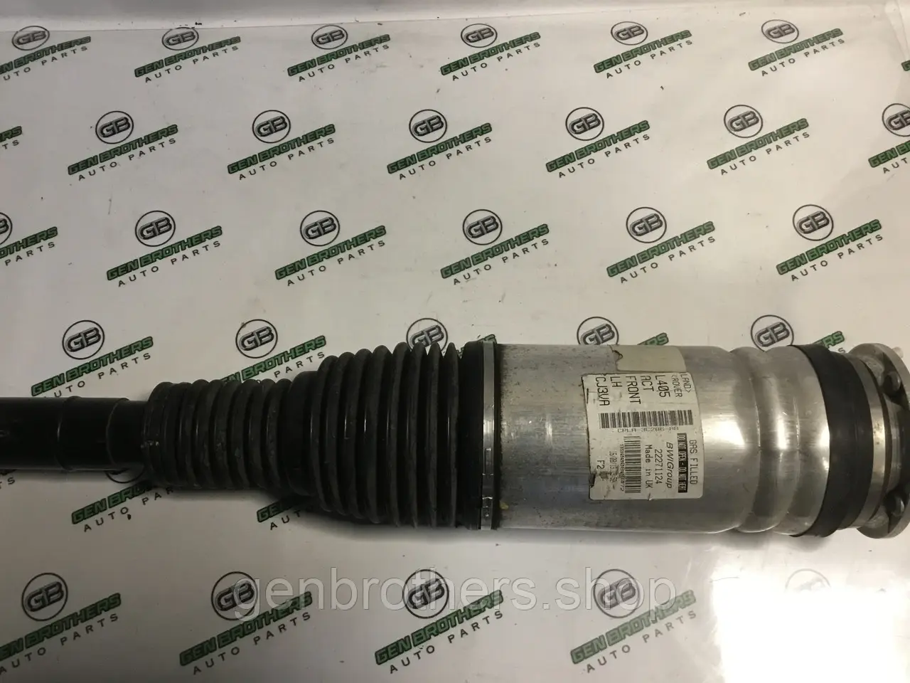 Амортизатор передній лівий