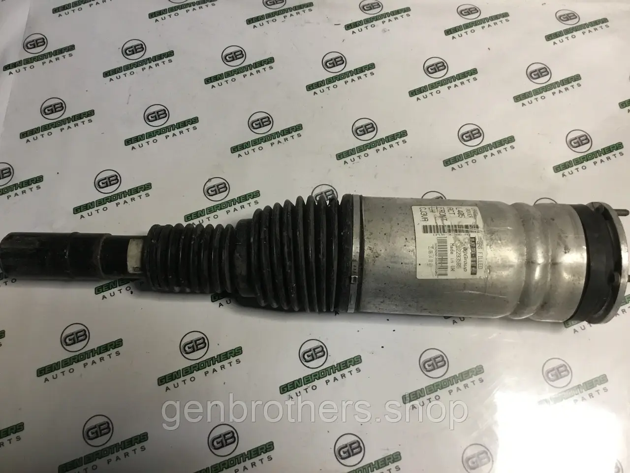 Амортизатор передній лівий