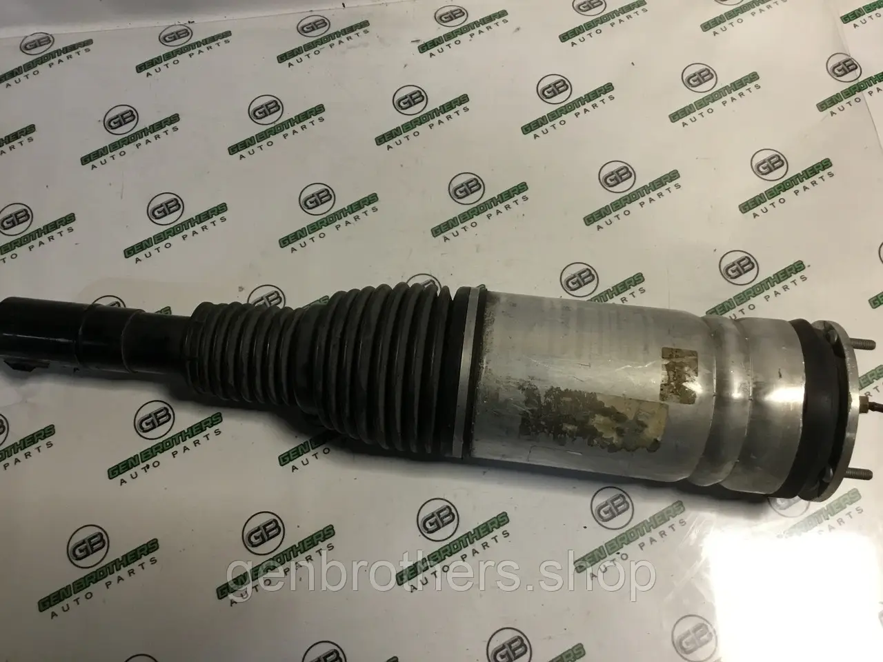 Амортизатор передній лівий