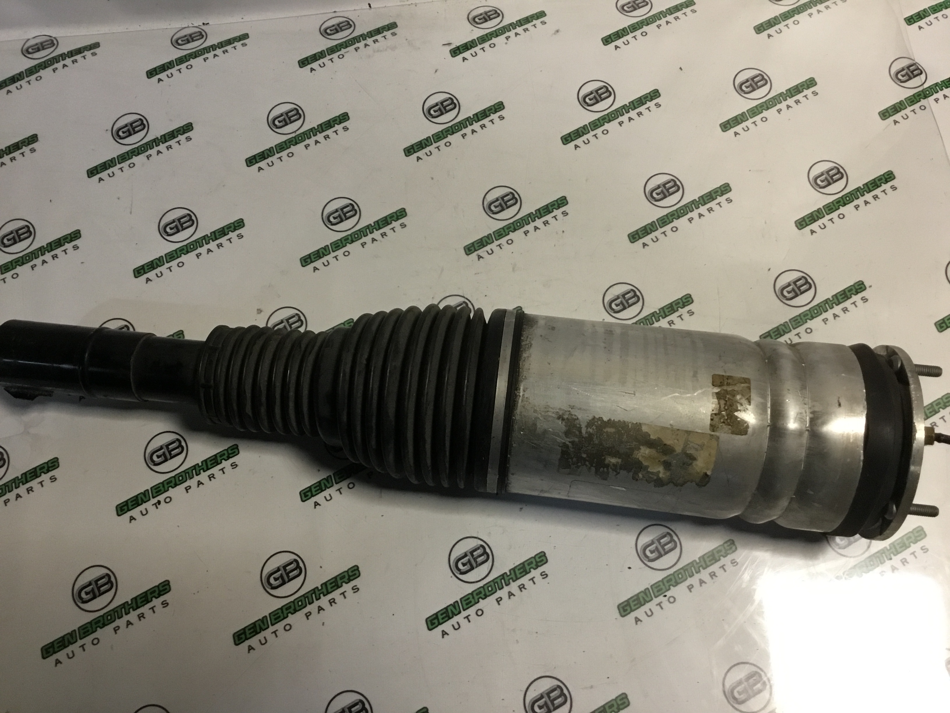 Амортизатор передній лівий