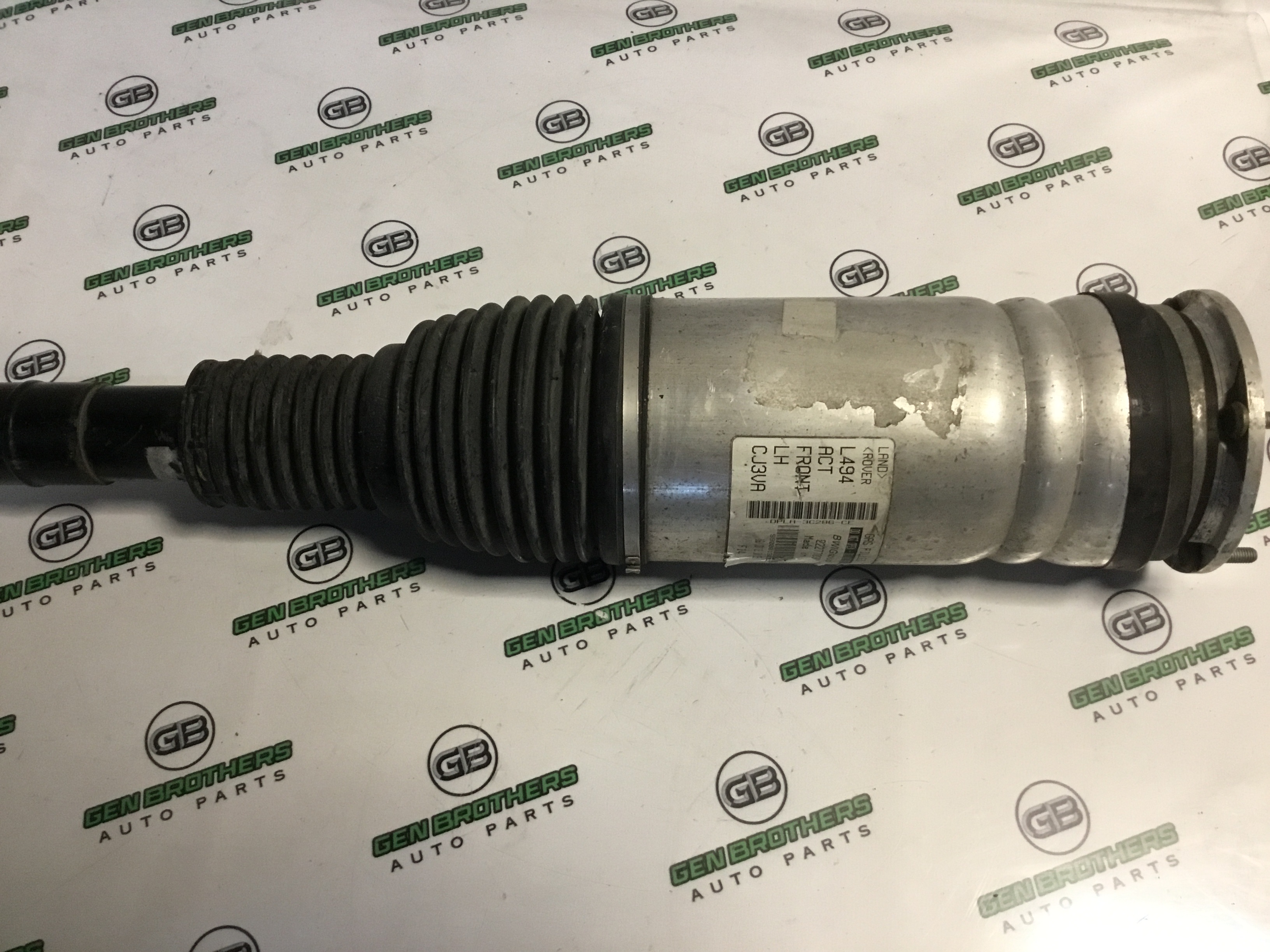 Амортизатор передній лівий