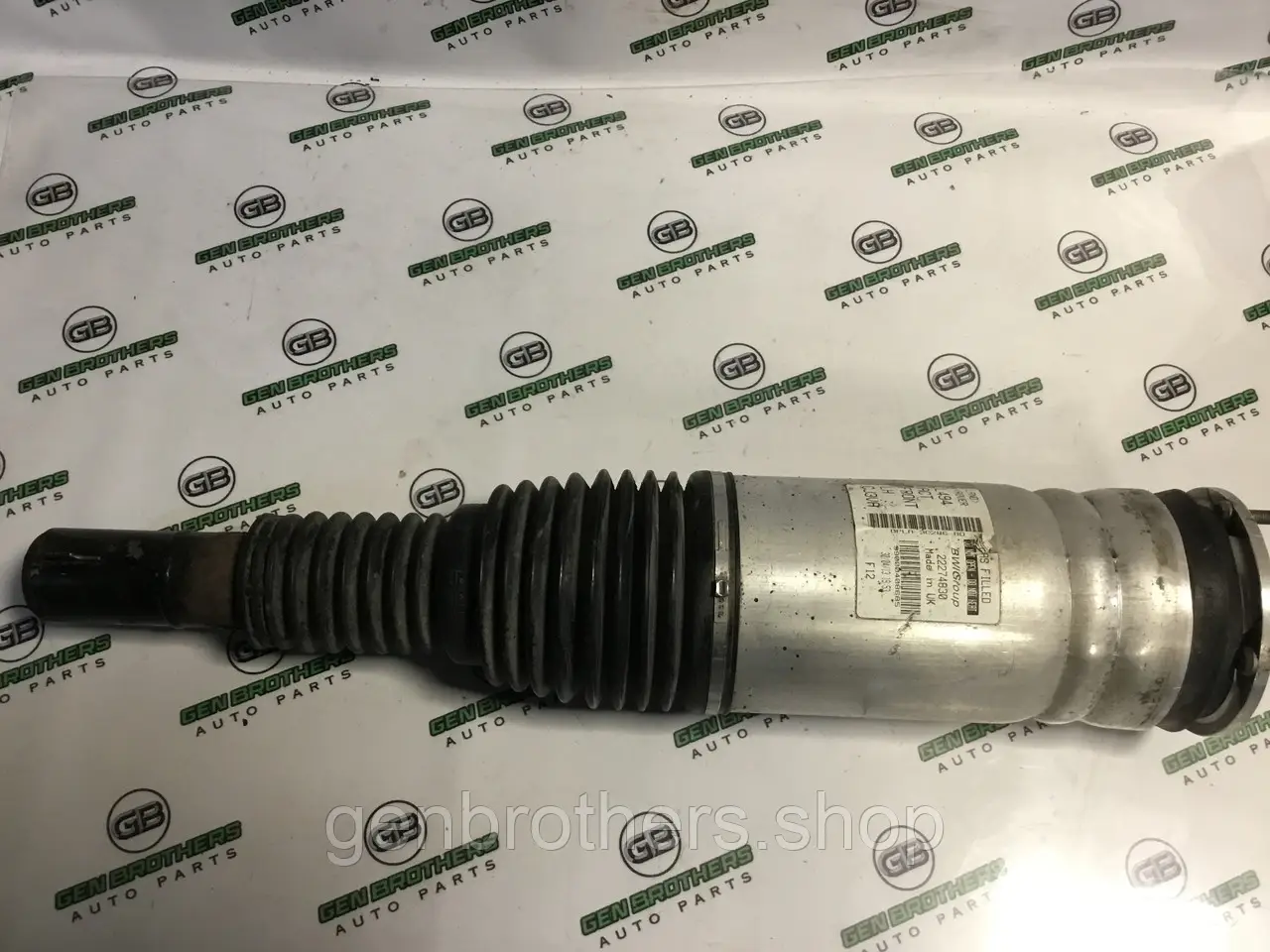 Амортизатор передній лівий