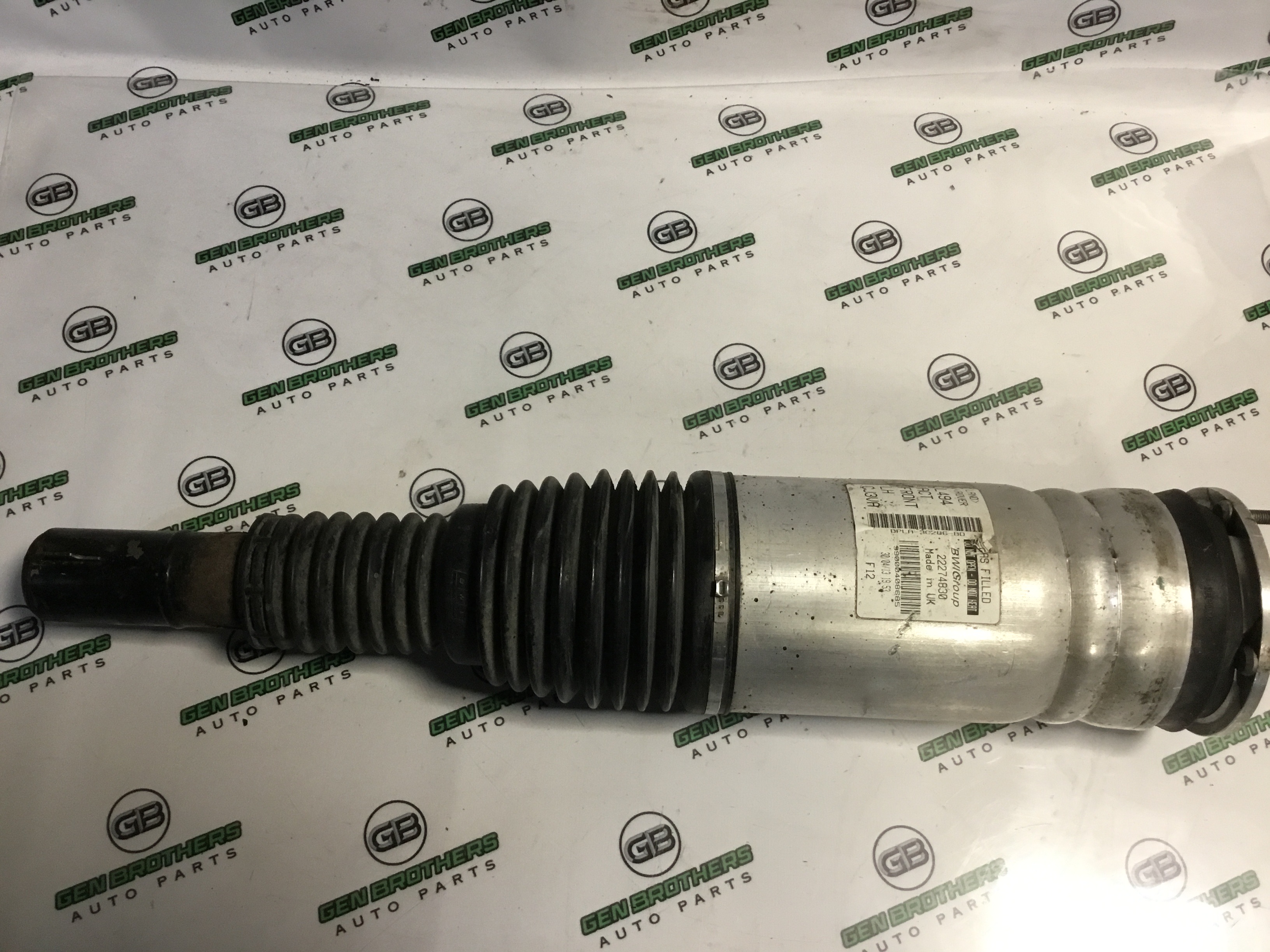 Амортизатор передній лівий