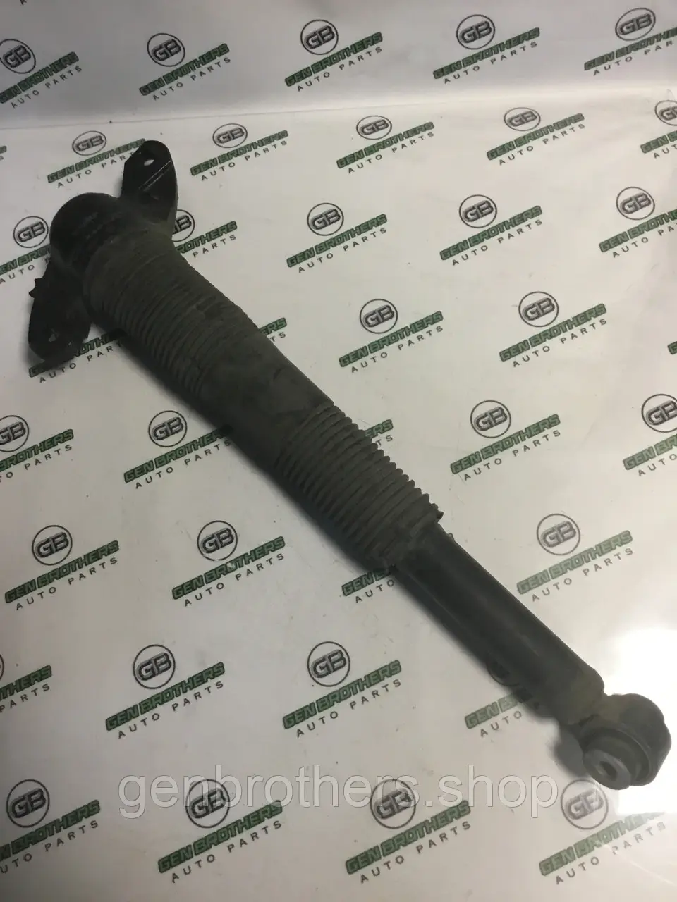 Амортизатор задній правий