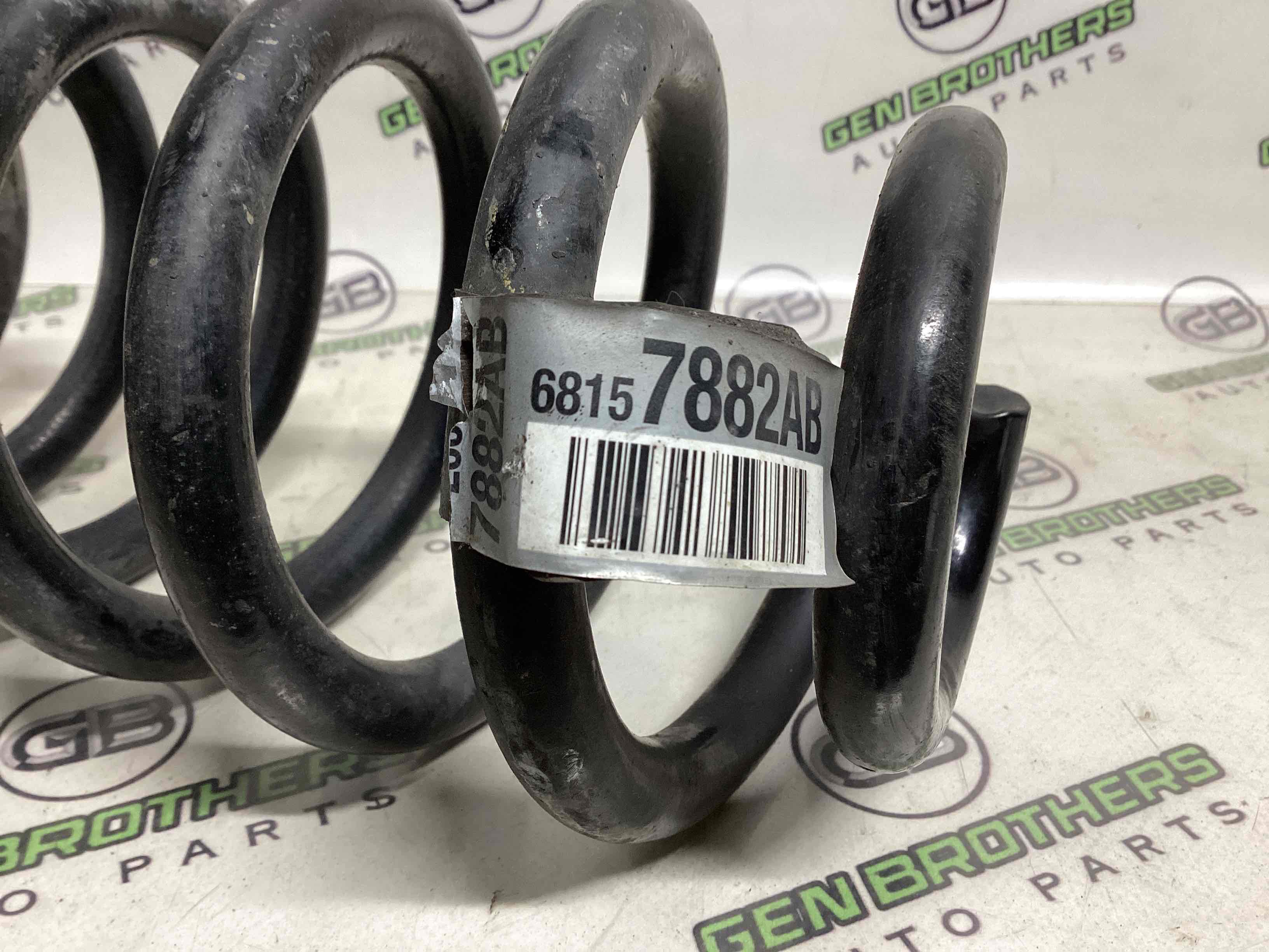 Пружина задня