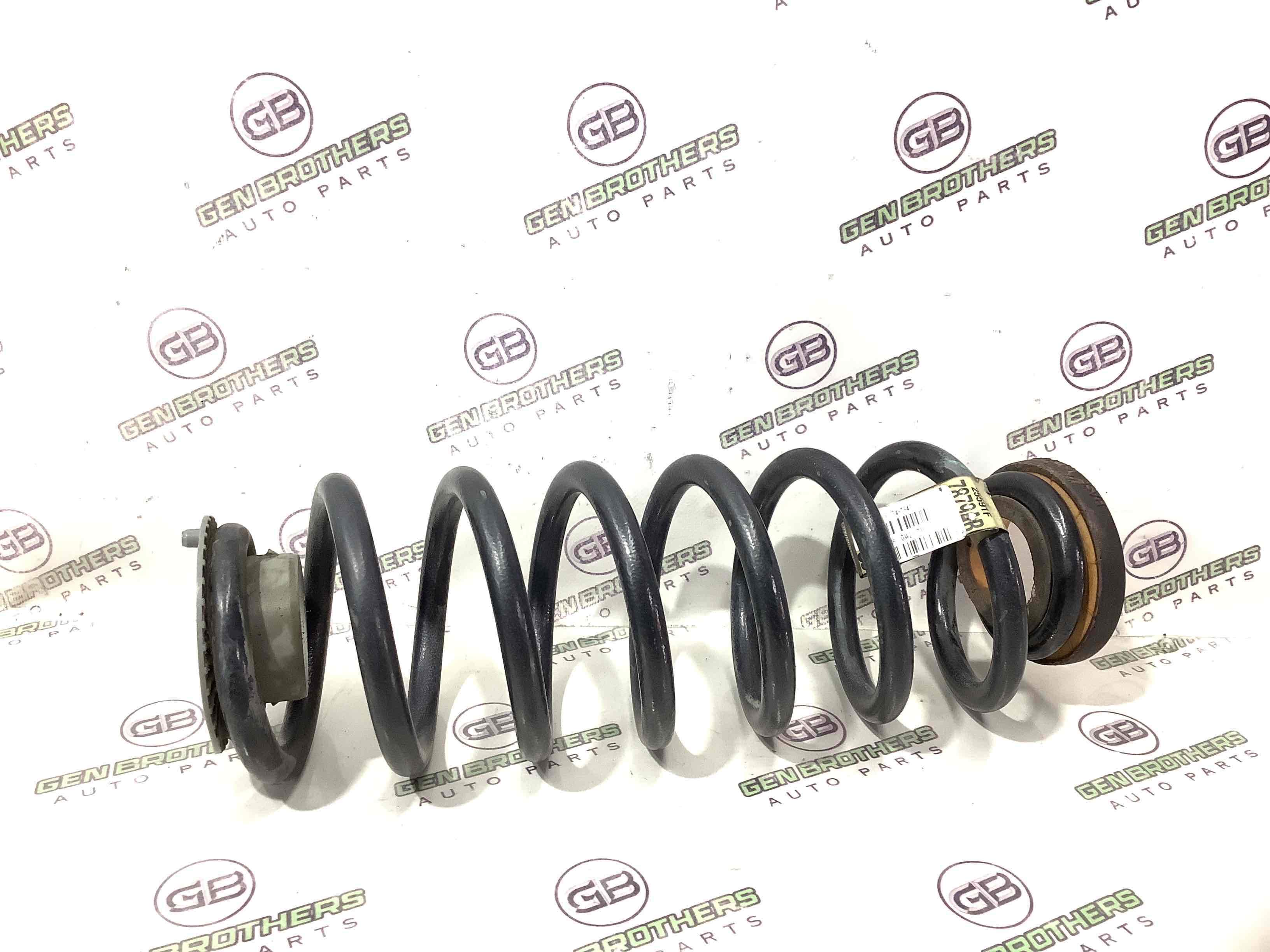 Пружина задня