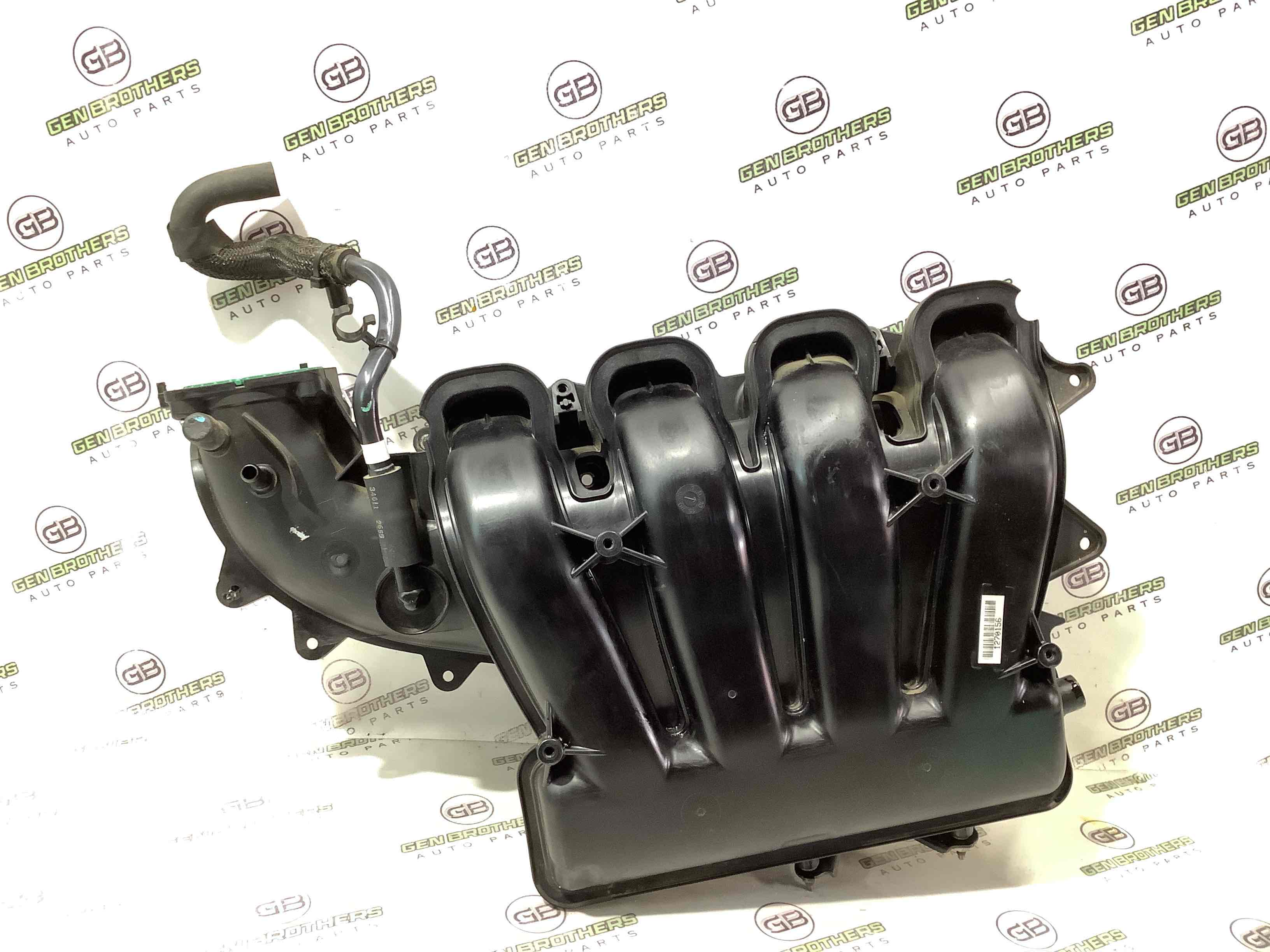 Колектор впускний