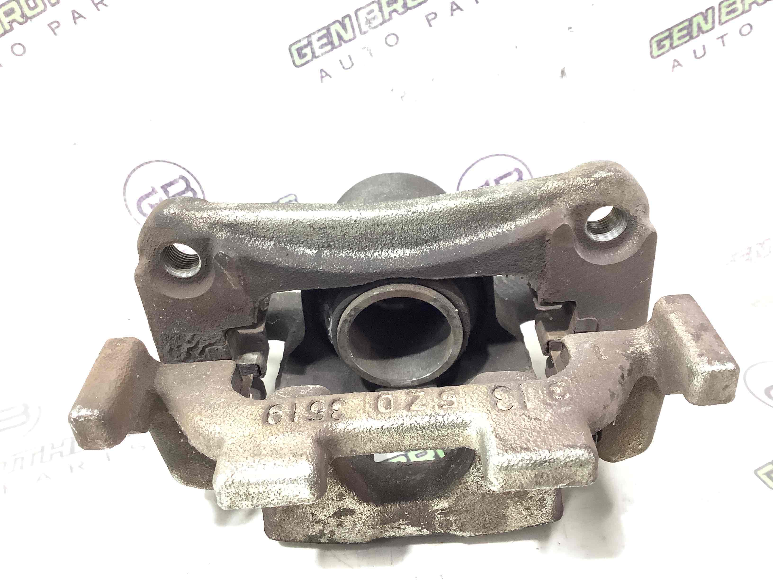 Супорт задній правий