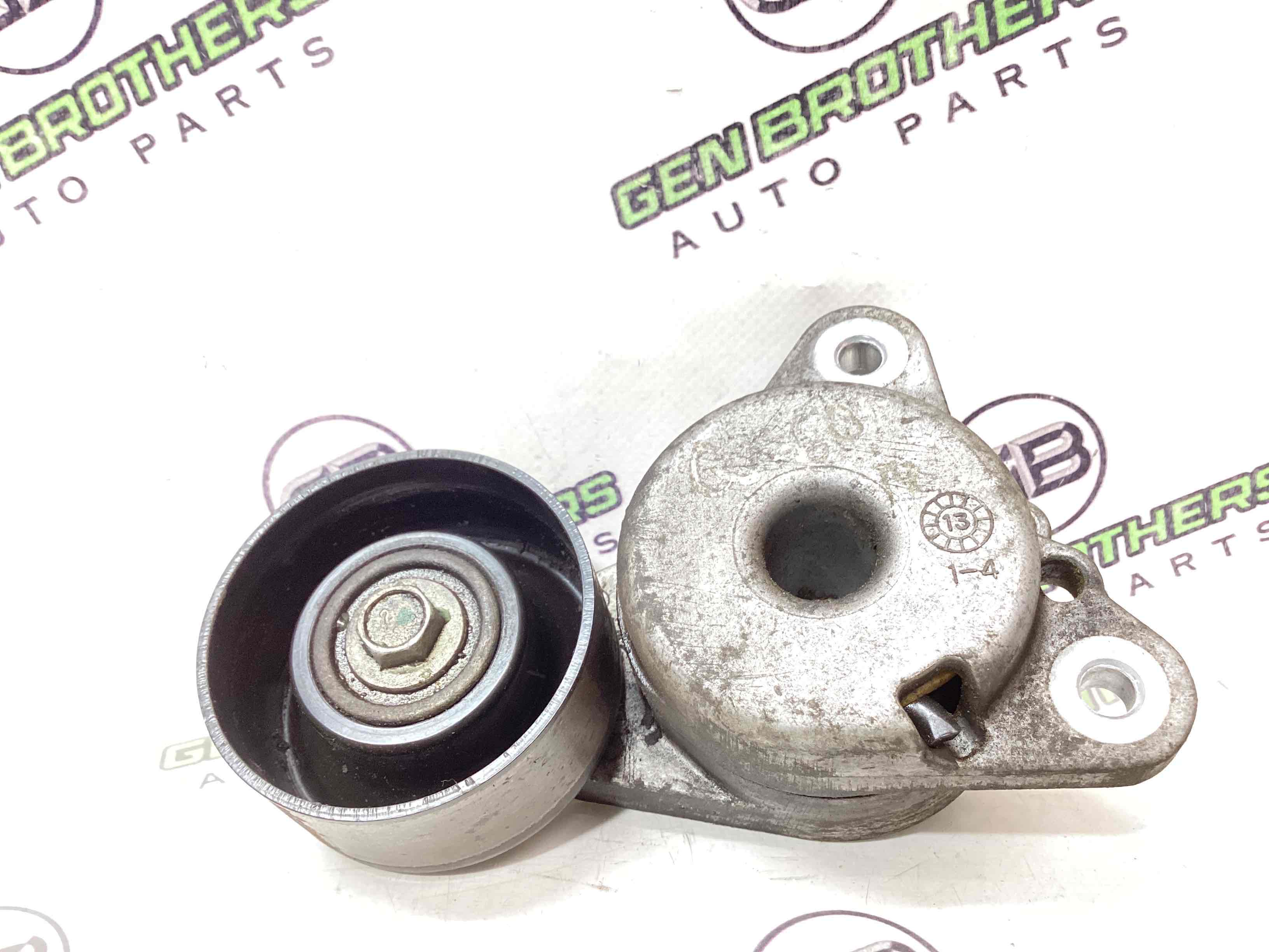 Механізм натягу ременя, ланцюга, ролика