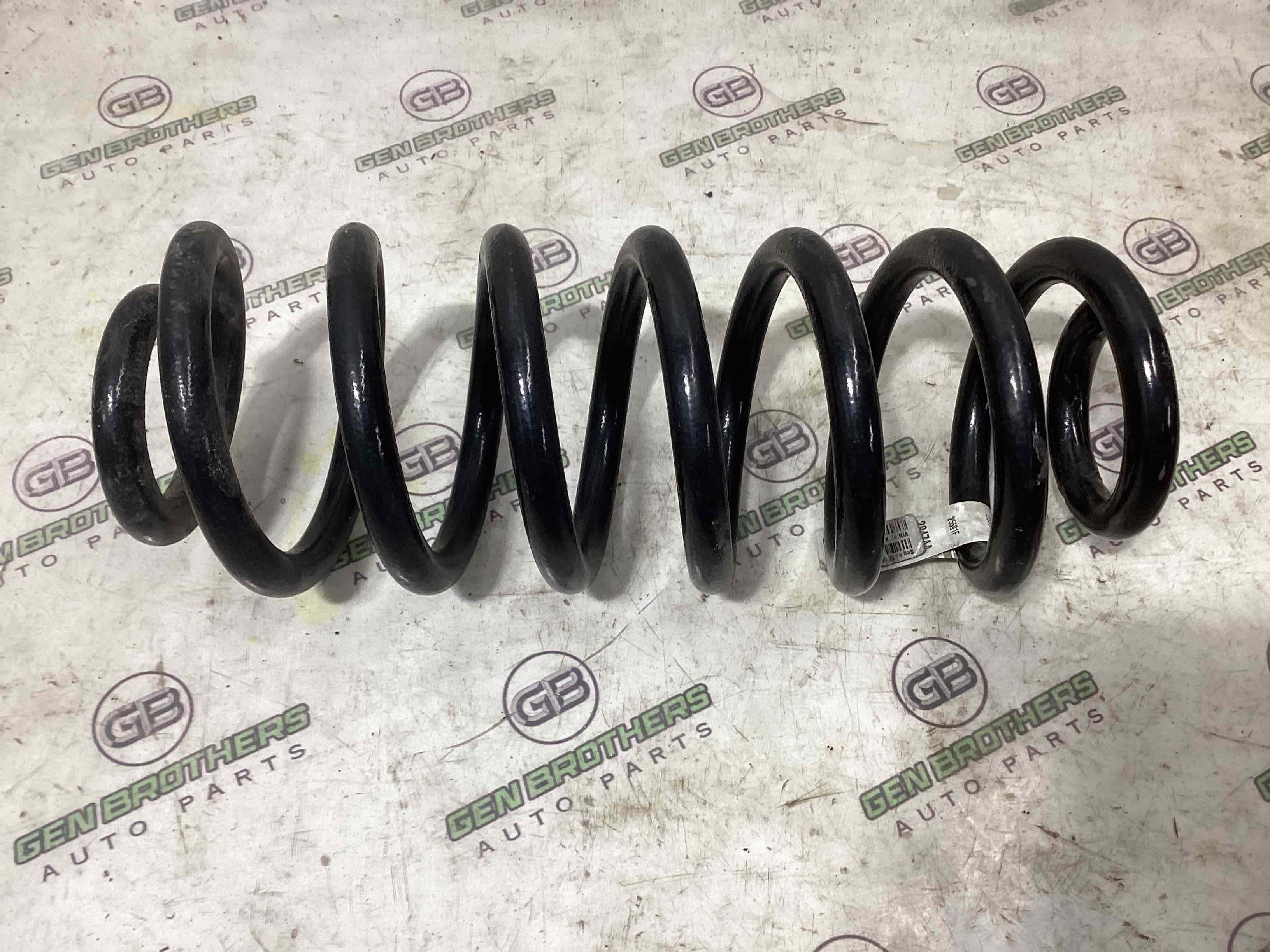 Пружина задня