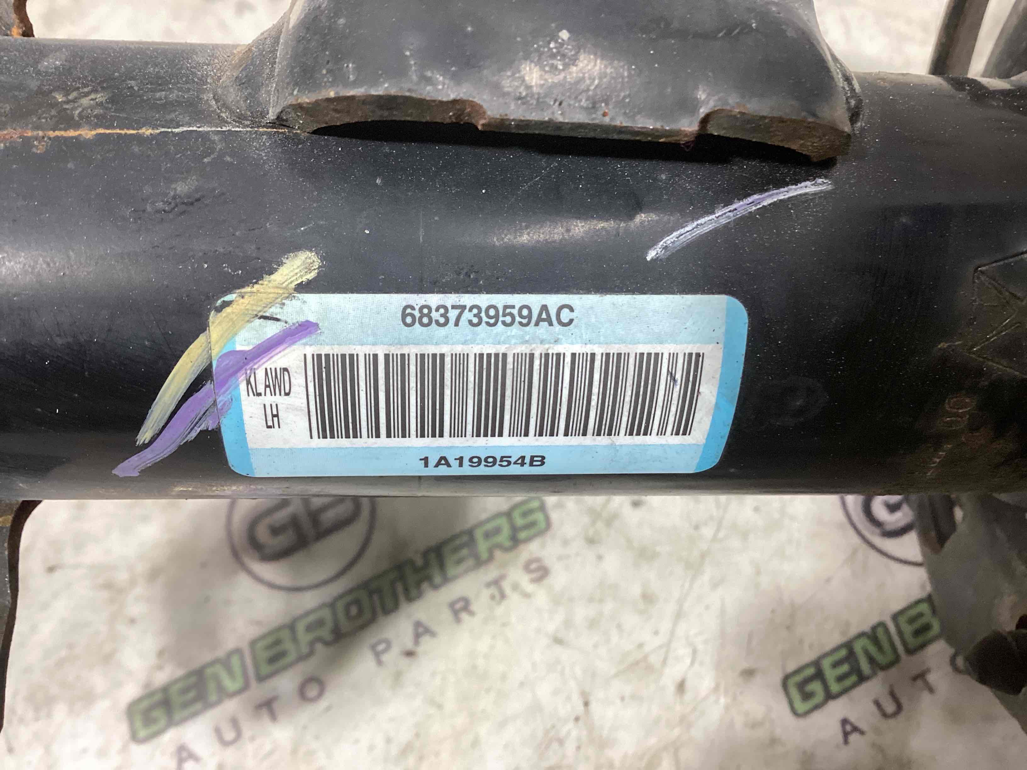 Амортизатор передній лівий