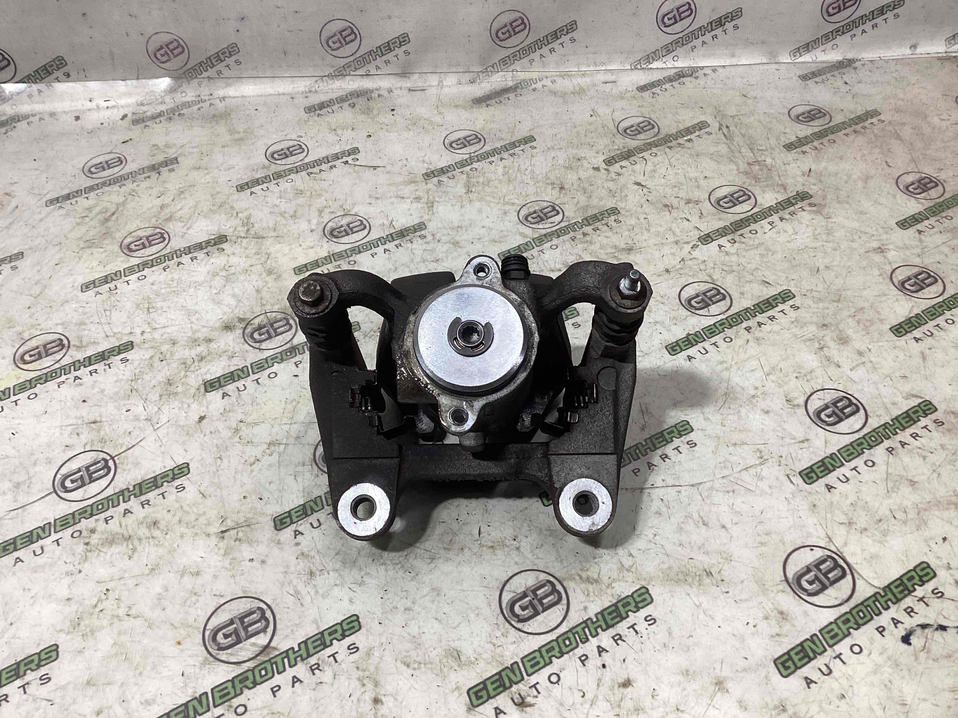 Супорт задній лівий