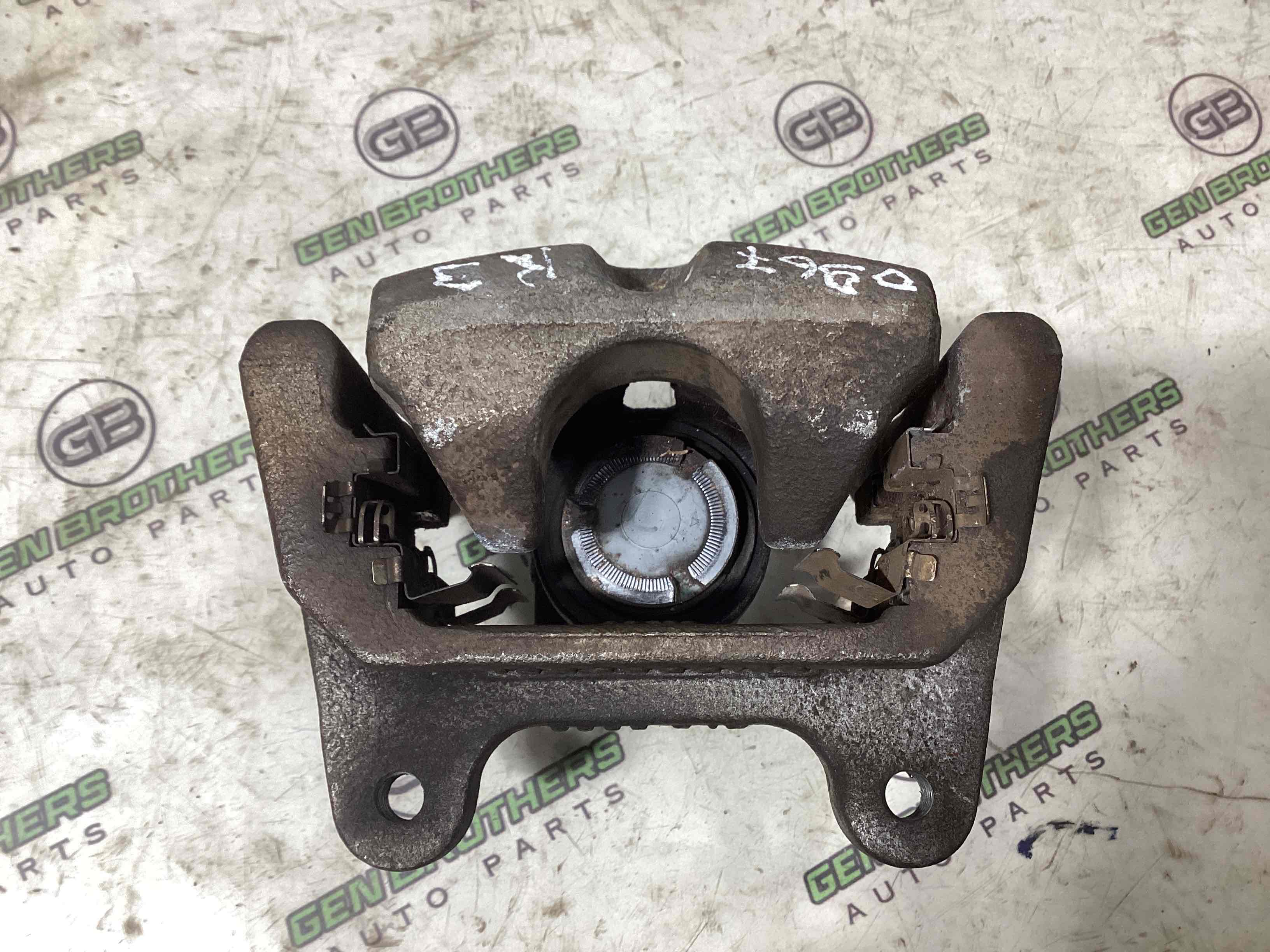 Супорт задній правий