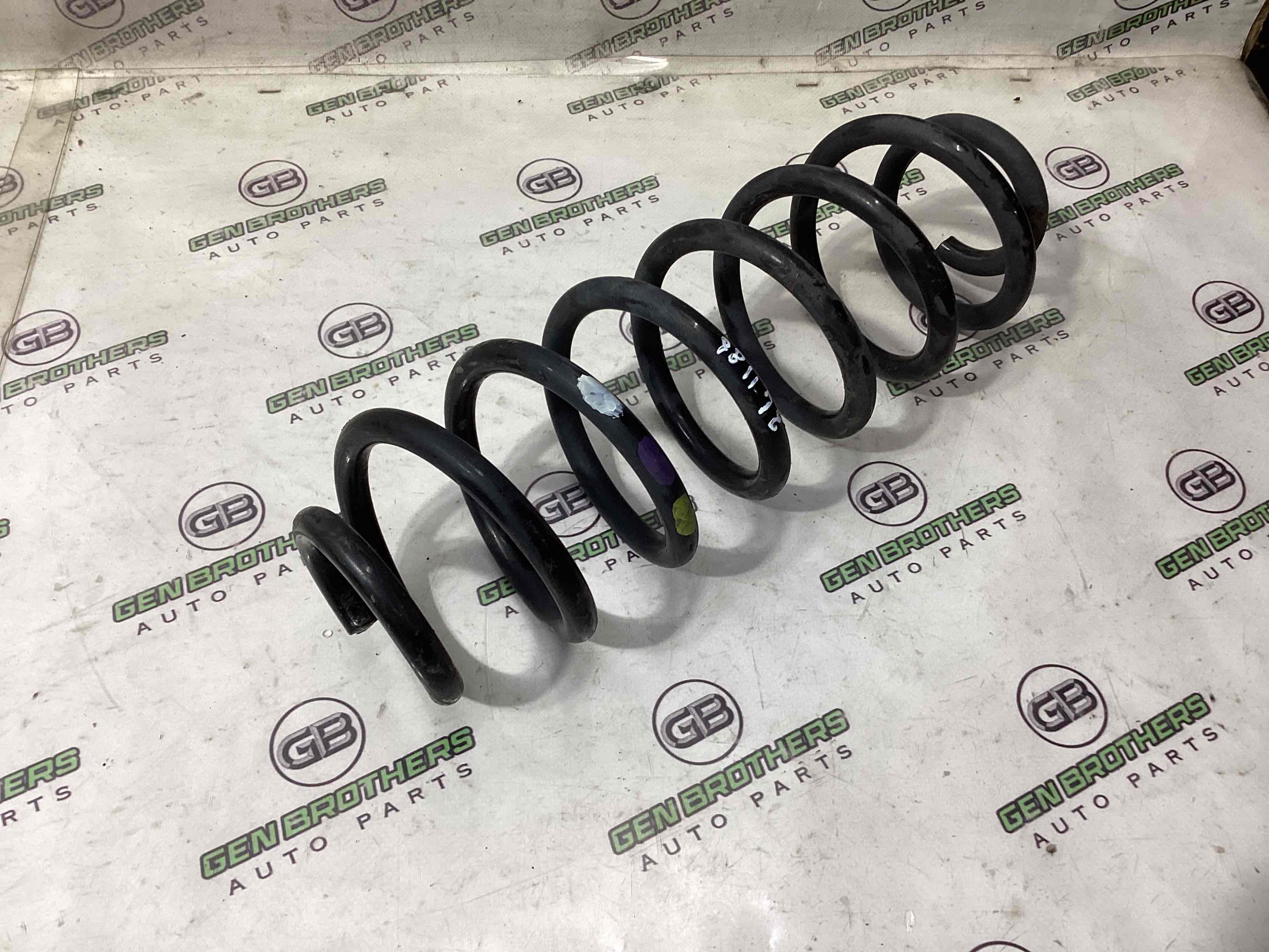 Пружина задняя