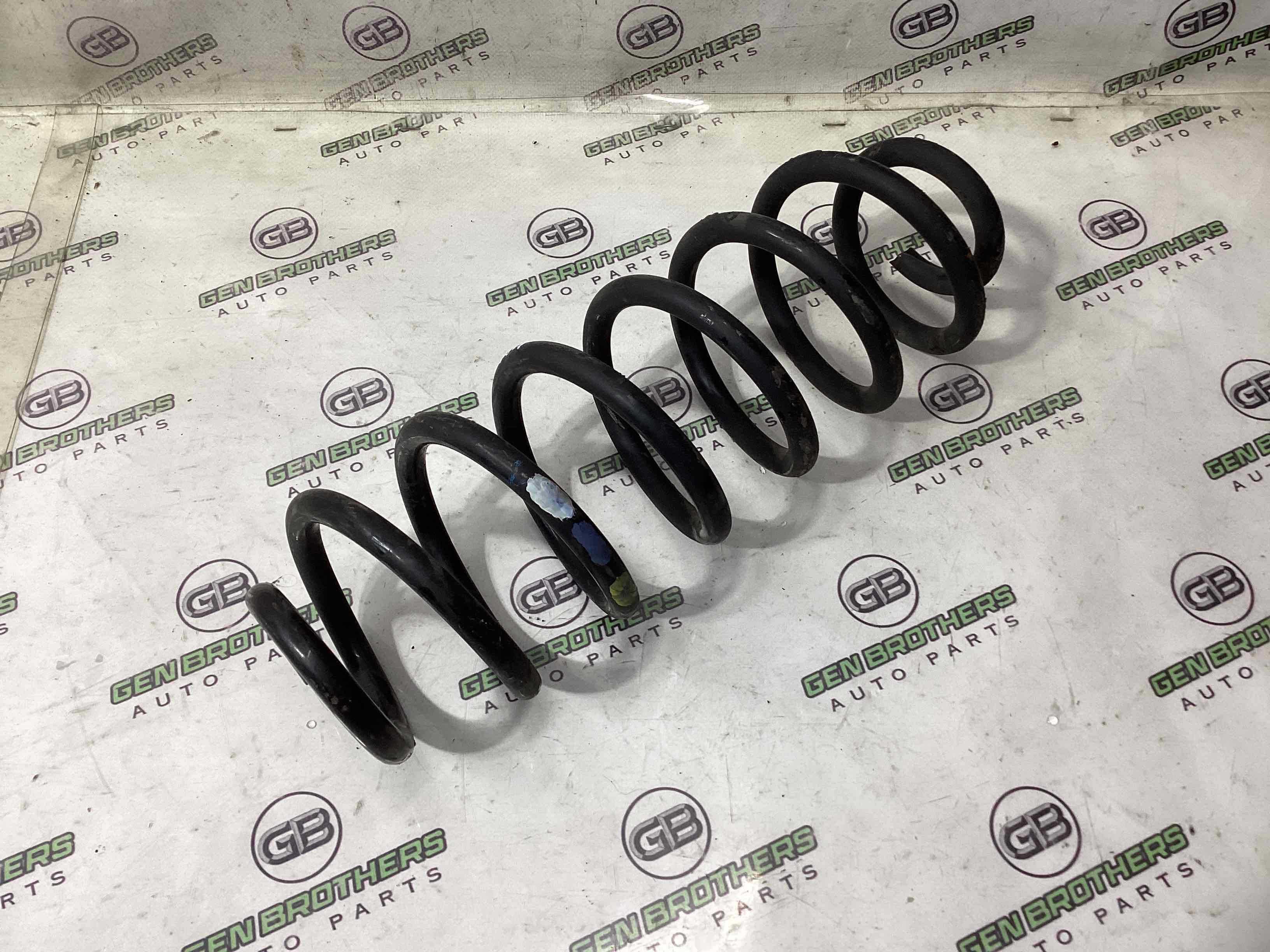 Пружина задняя