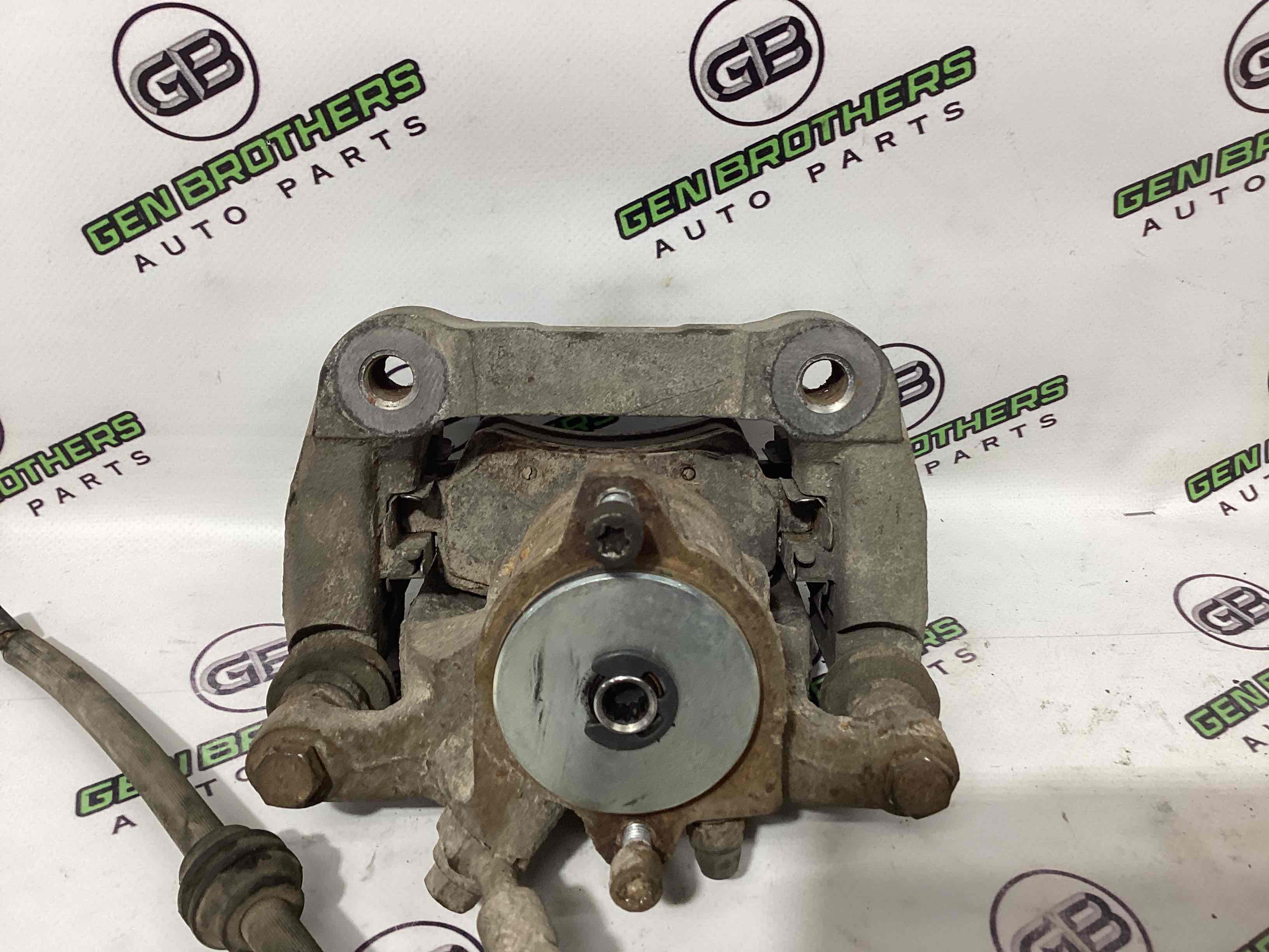 Супорт задній правий