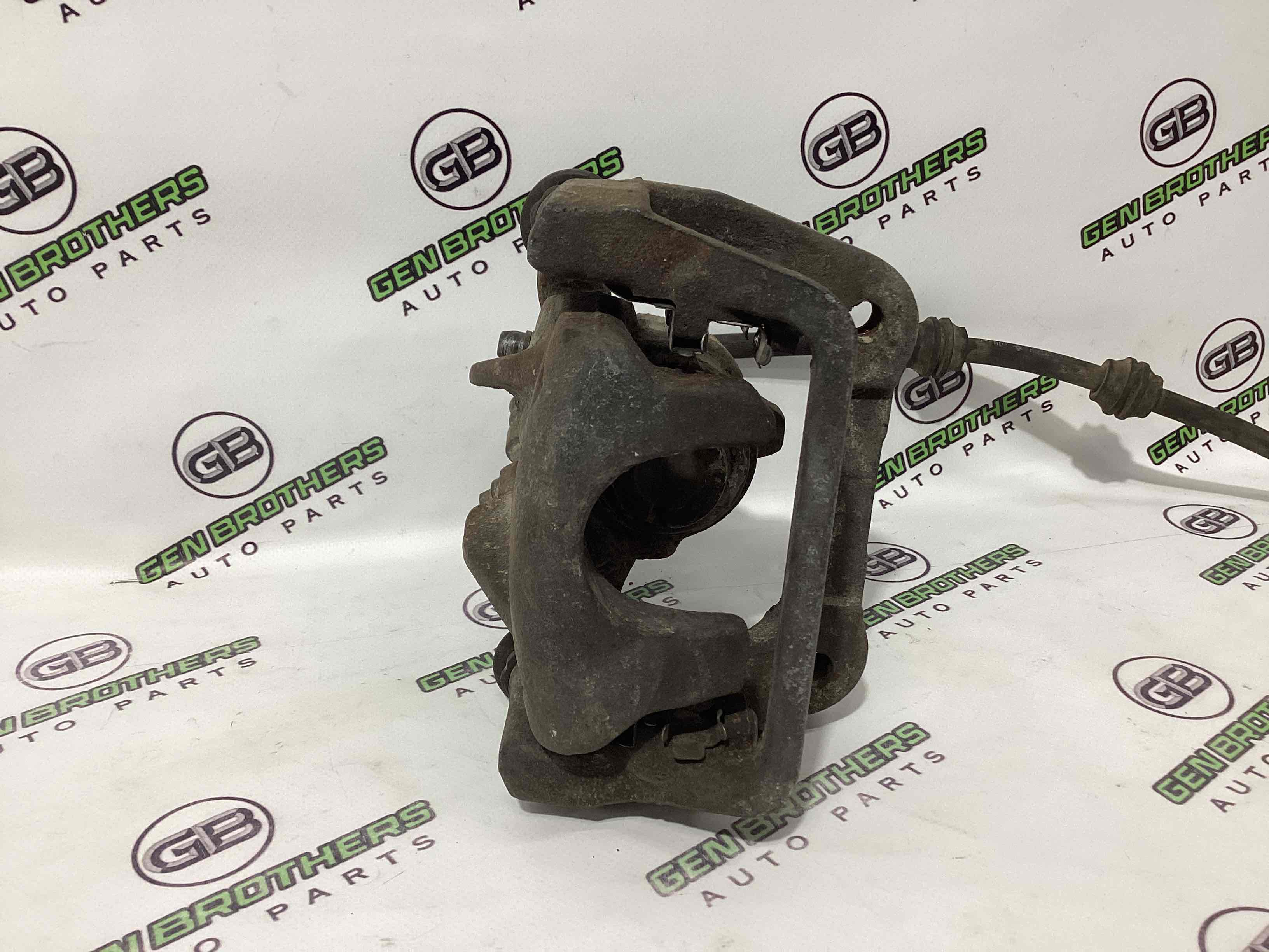 Супорт задній правий