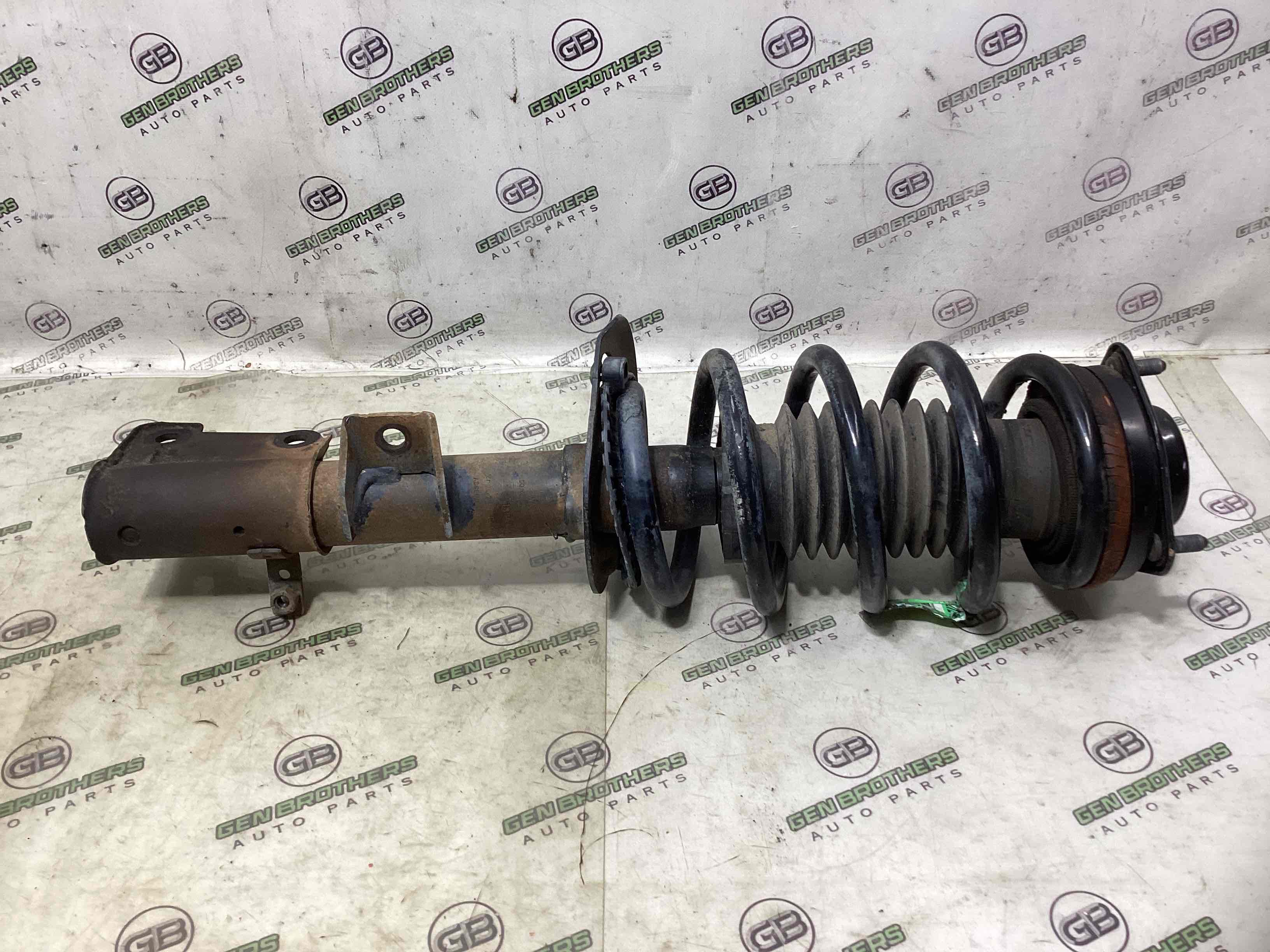 Амортизатор передний левый