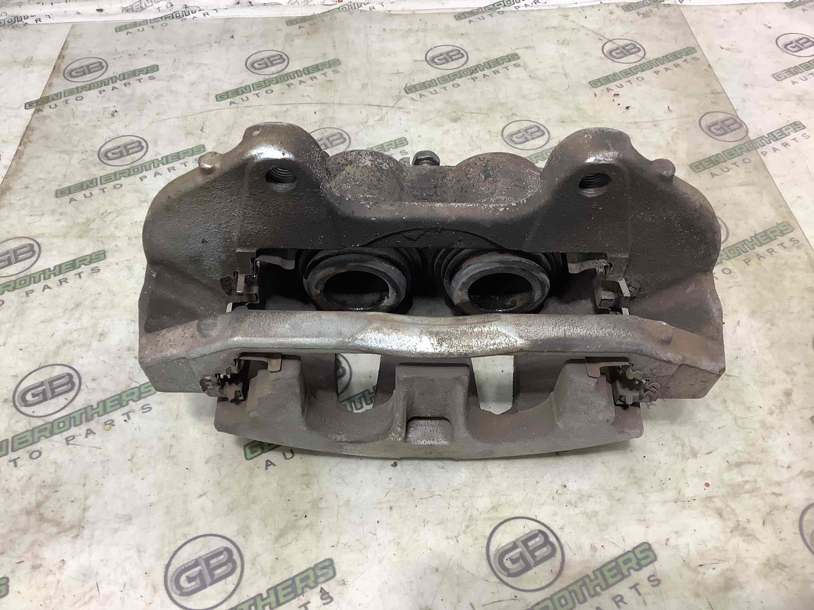 Суппорт передний левый