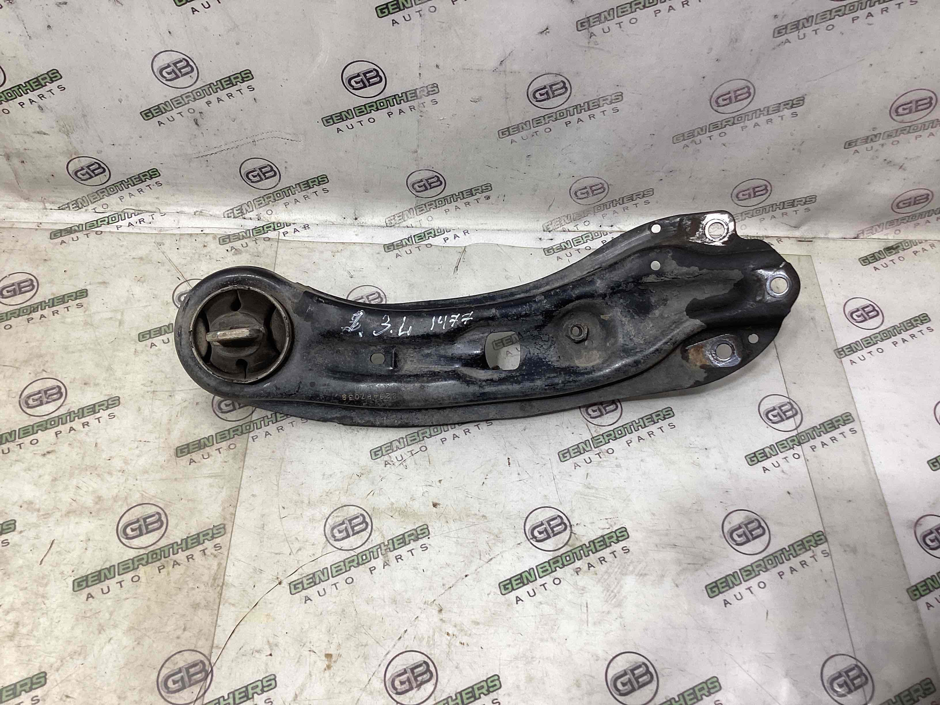 Рычаг задний левый