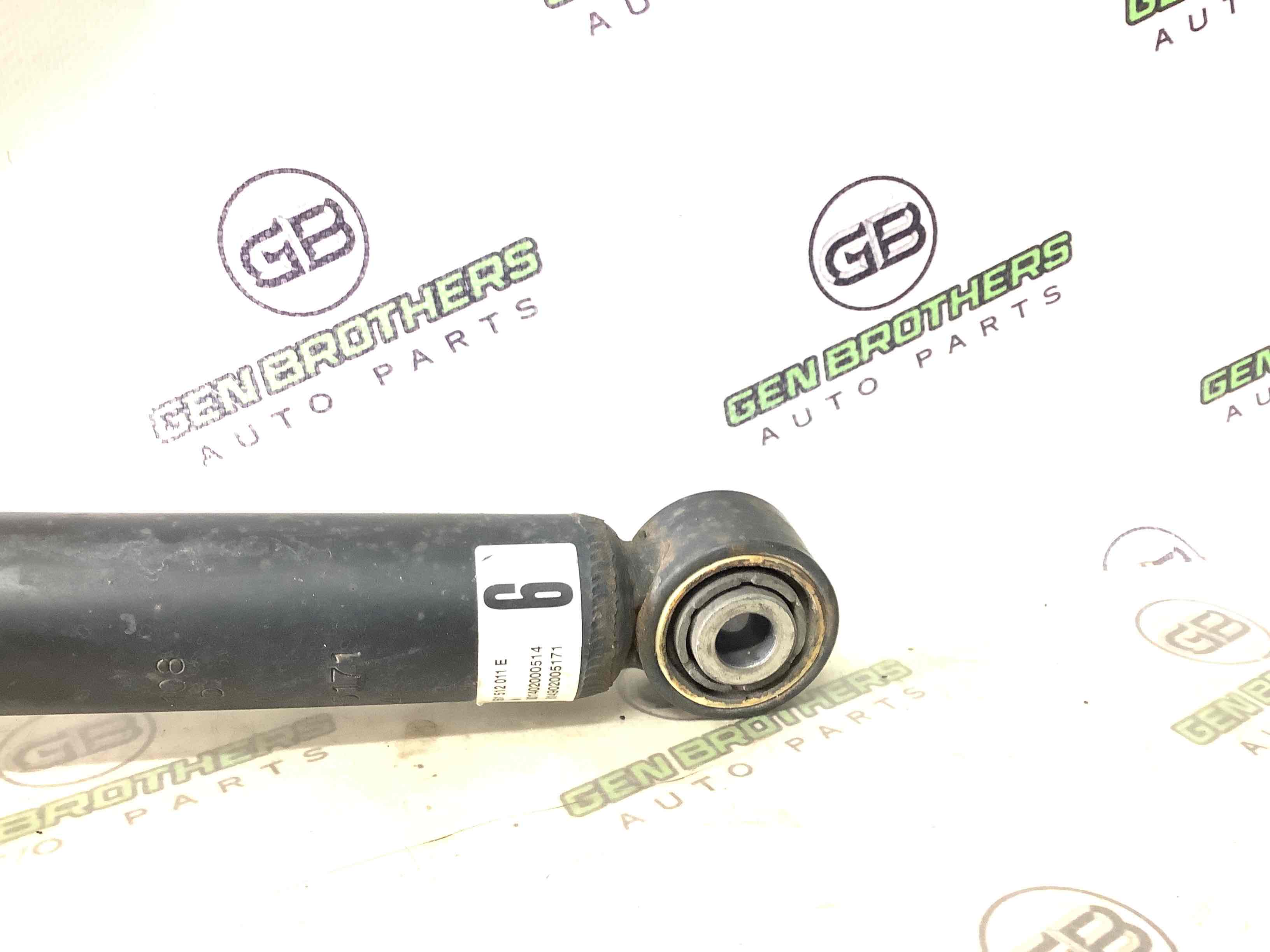 Амортизатор задній лівий