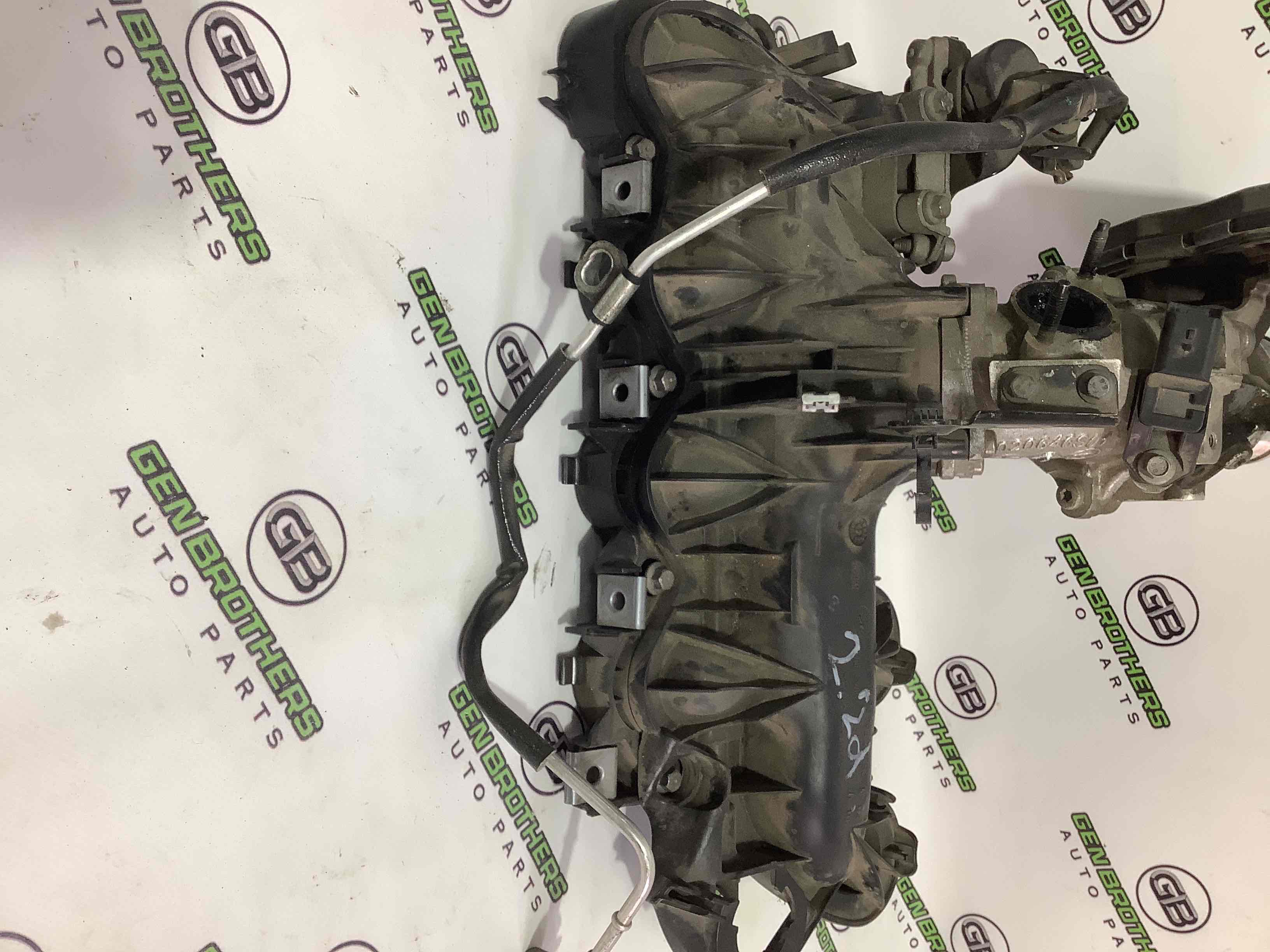 Колектор впускний