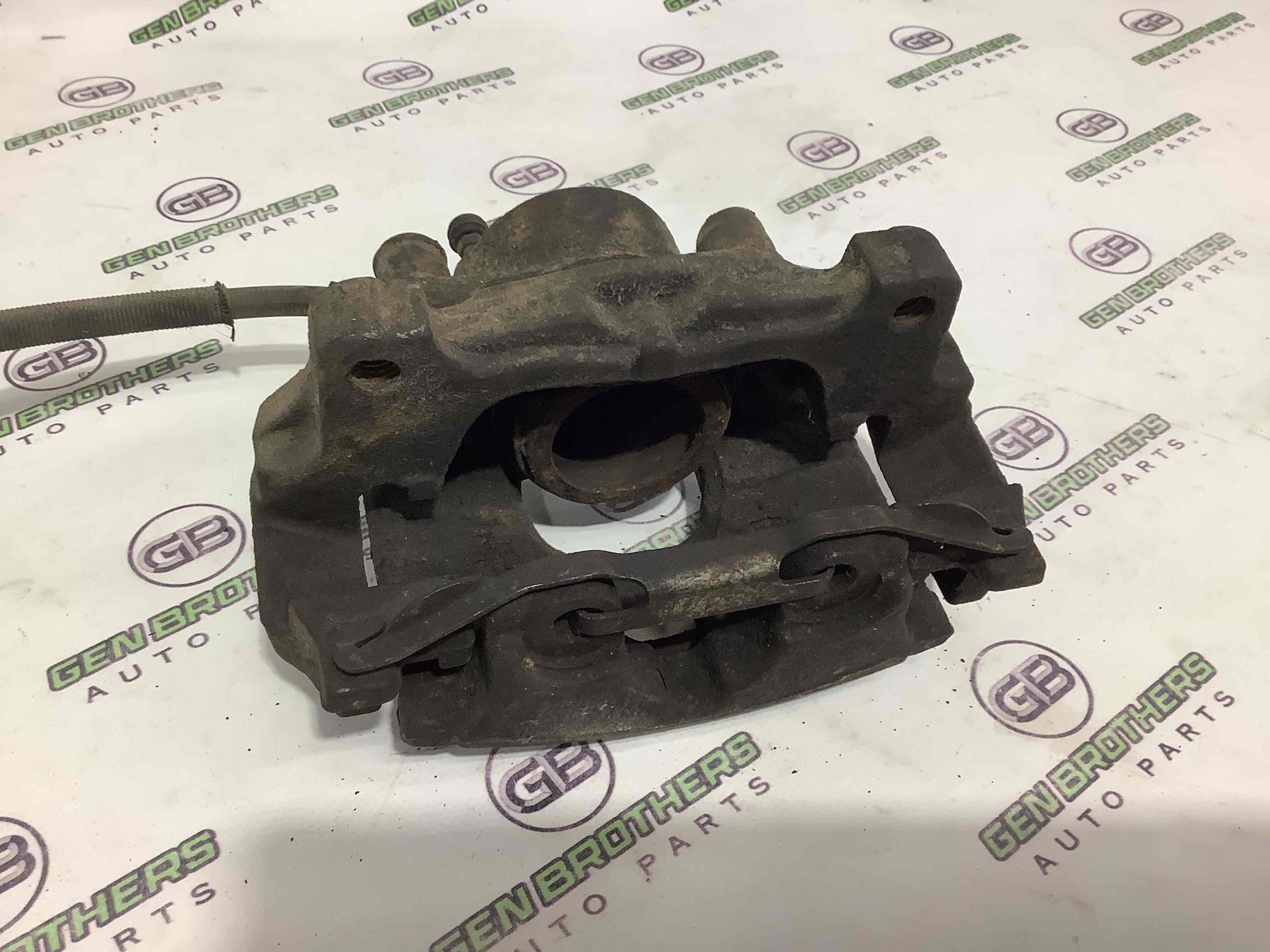 Супорт передній лівий