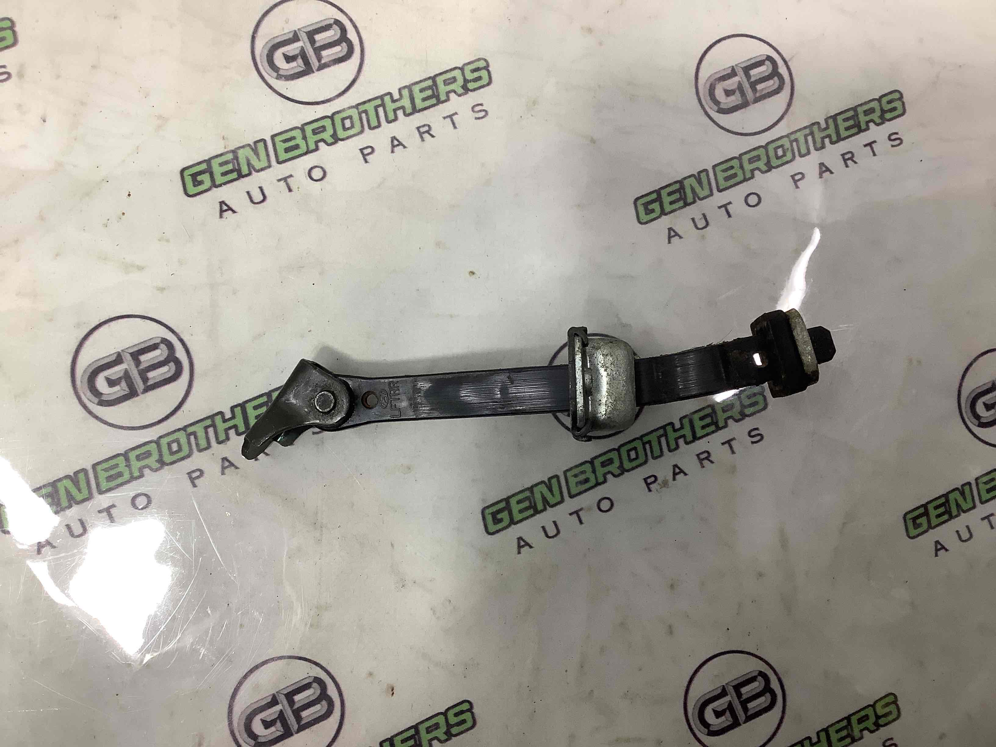 Обмежувач відчинення дверей