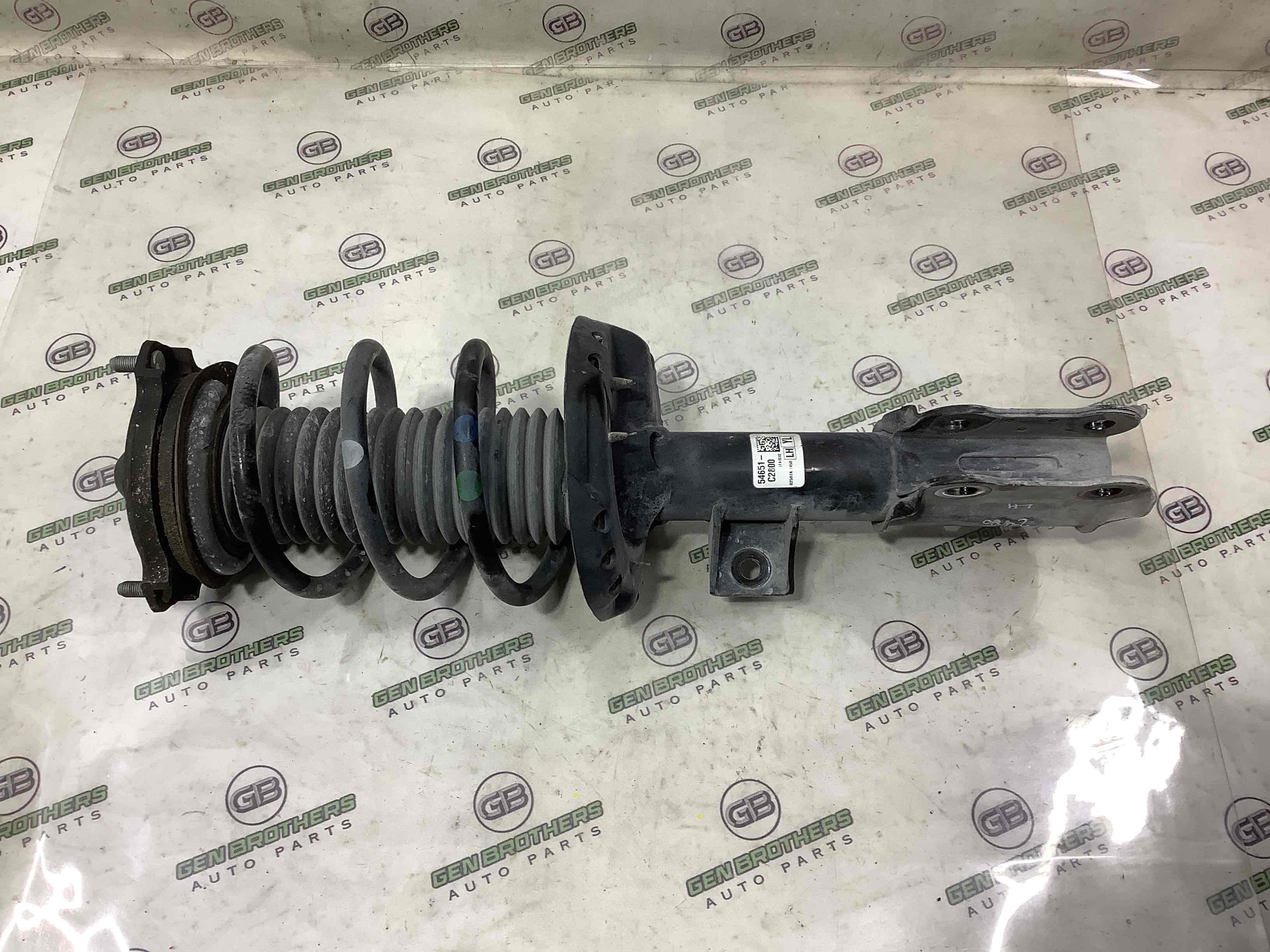 Амортизатор передній лівий