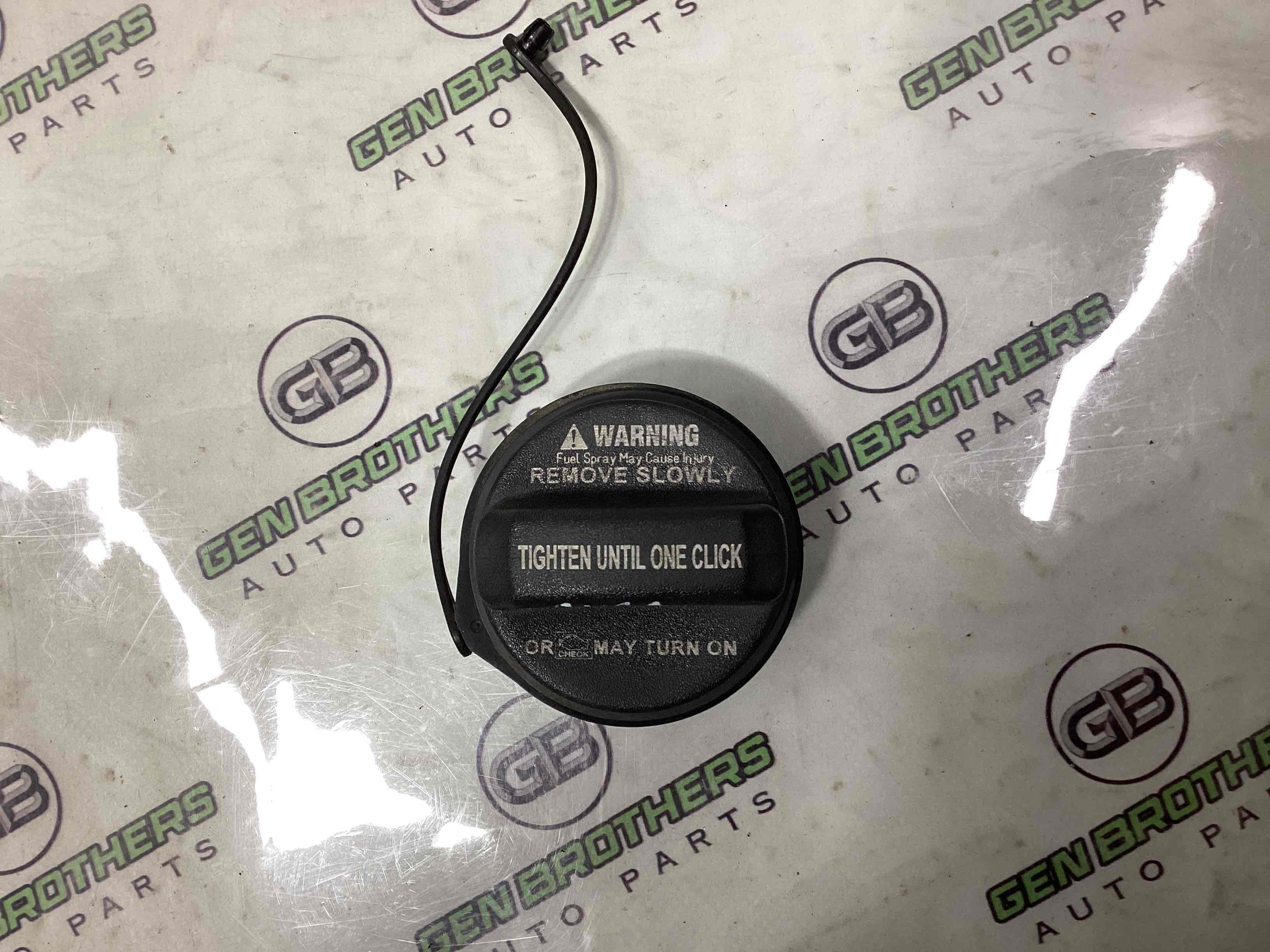 Корок бака, кришка заливної горловини, дотяжка