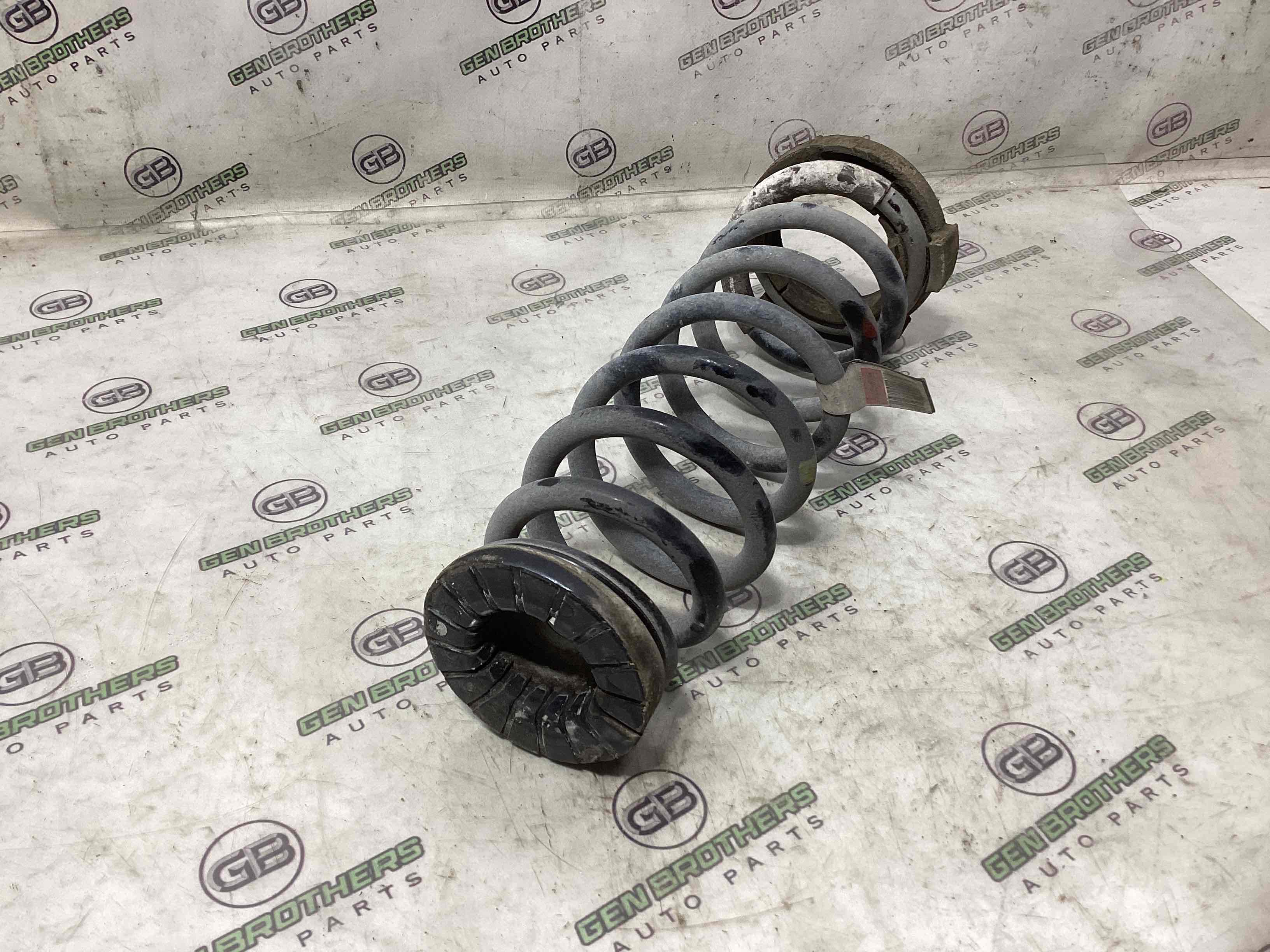 Пружина задня