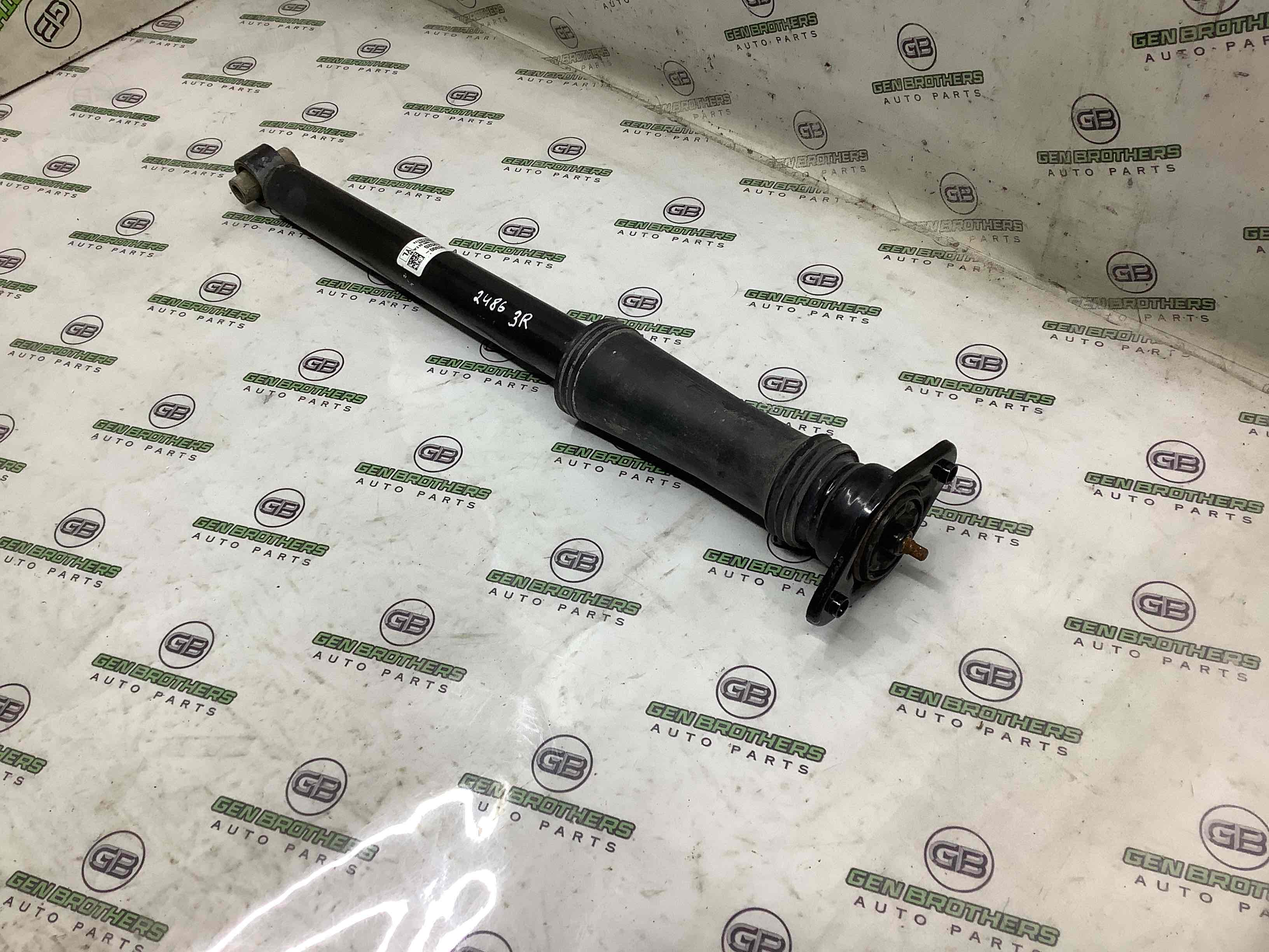 Амортизатор задній правий