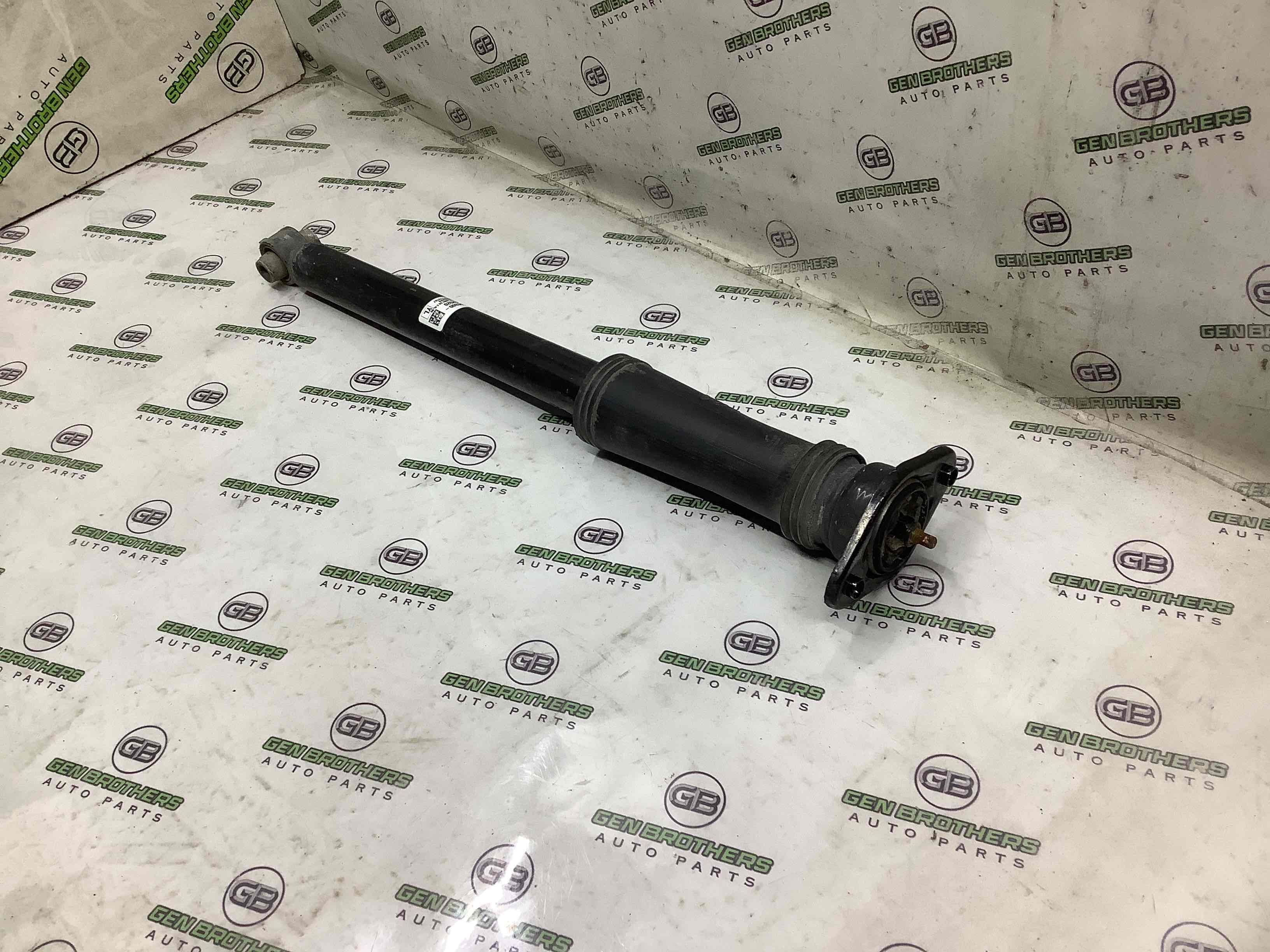 Амортизатор задній лівий