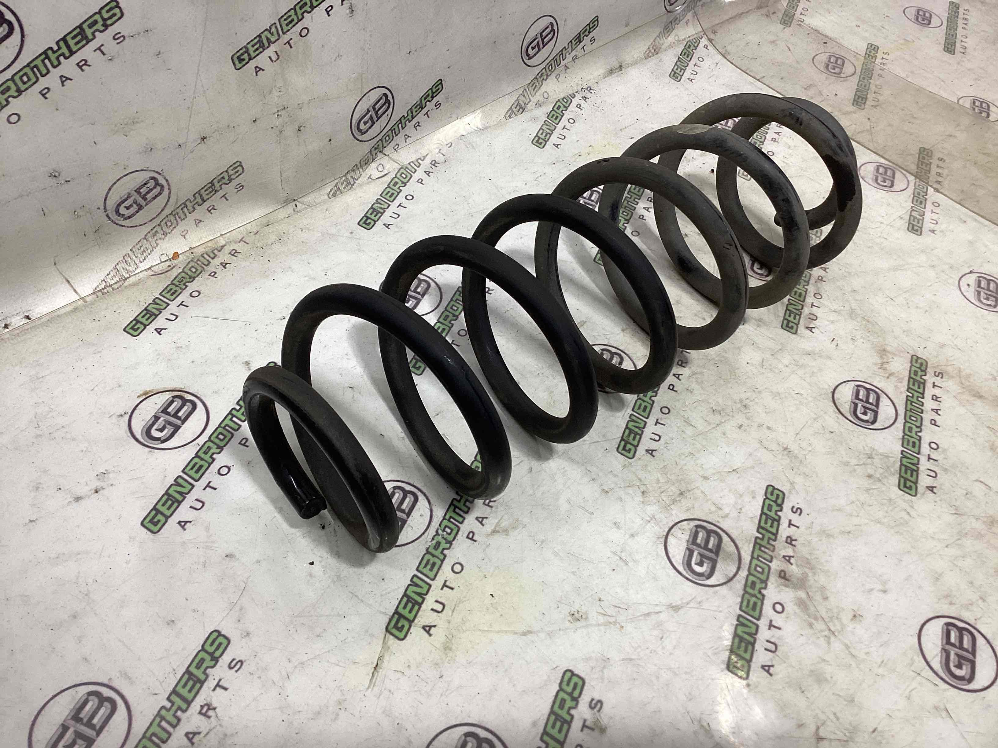 Пружина задня