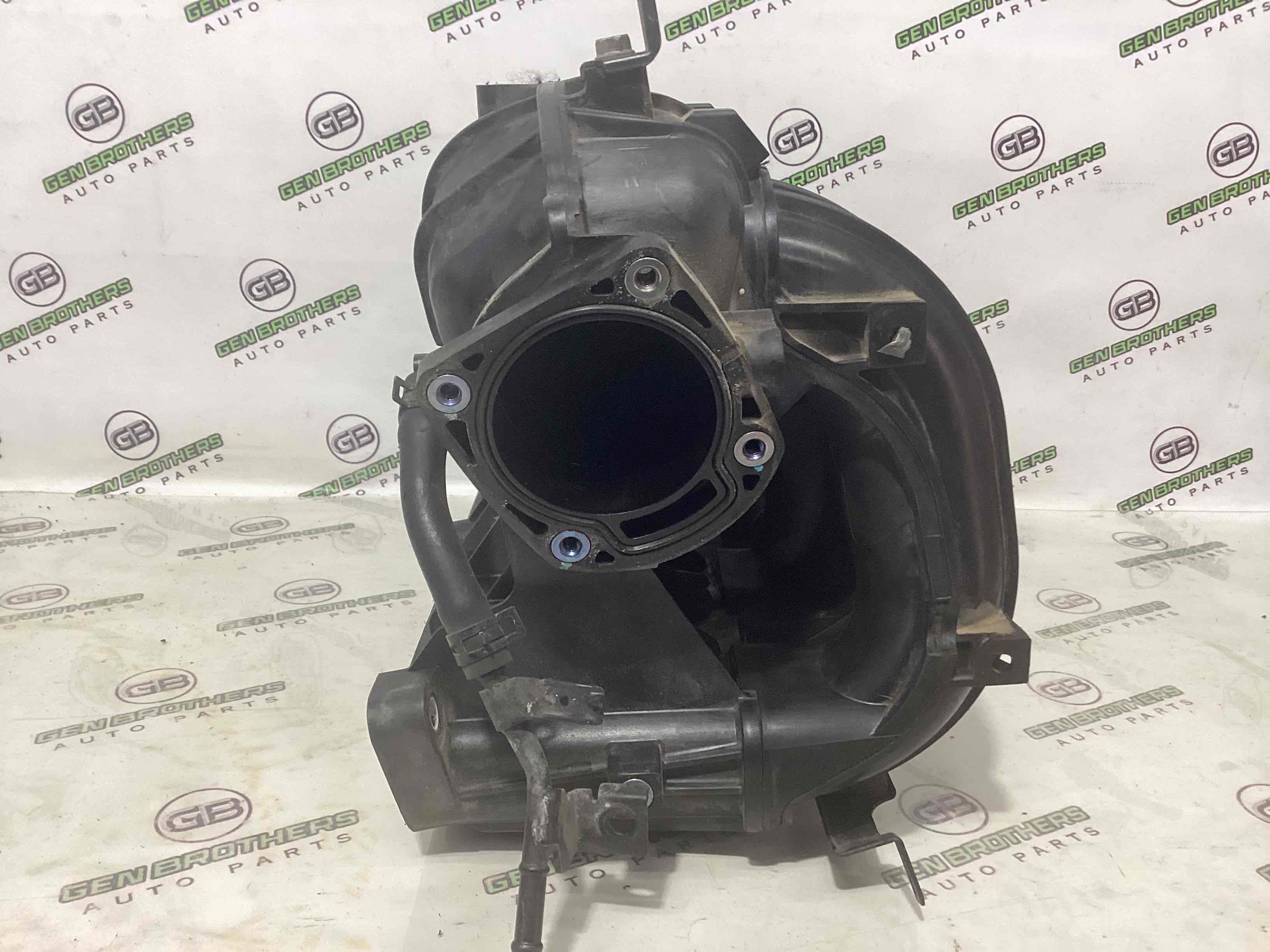 Колектор впускний