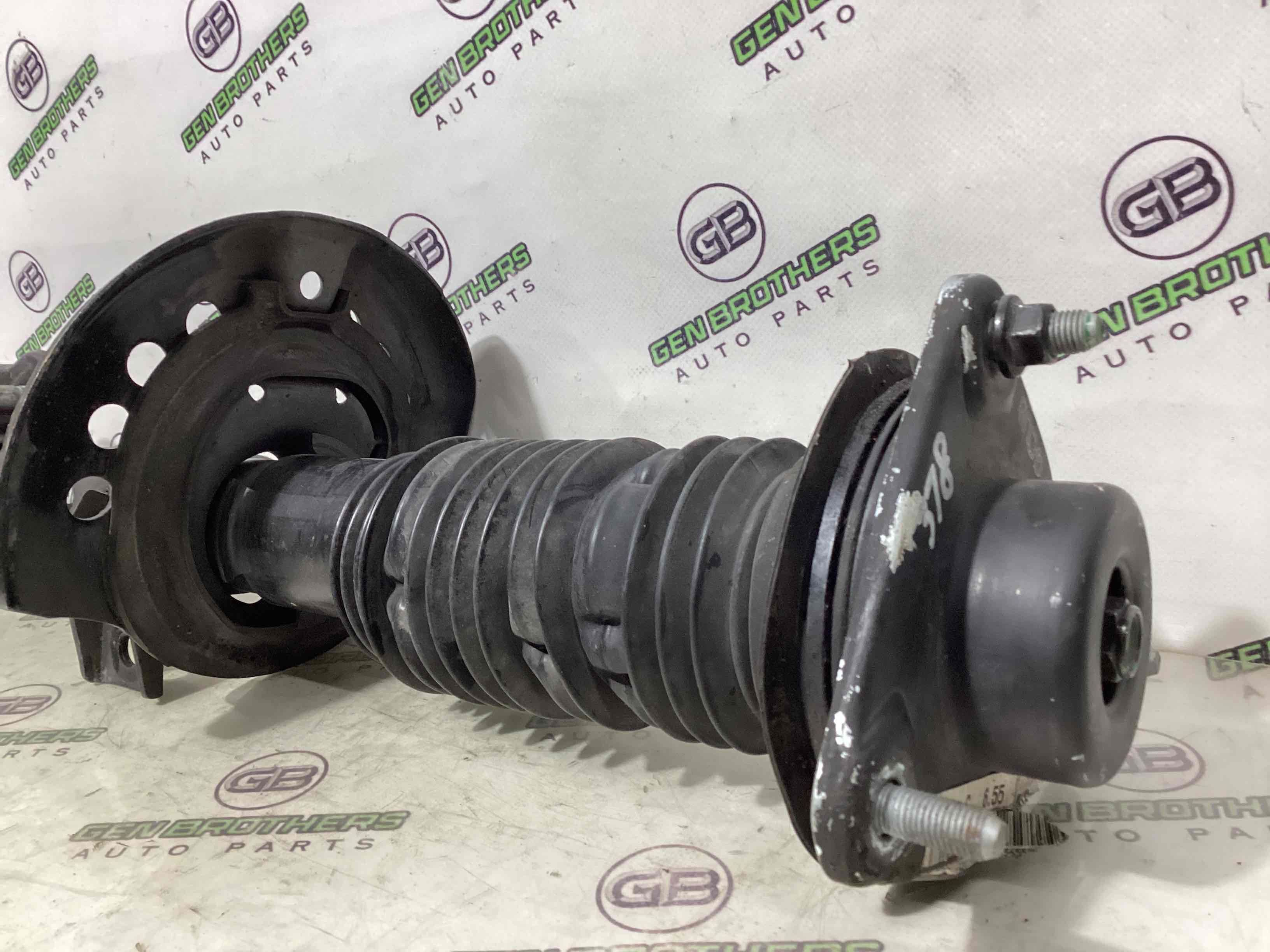 Амортизатор передній лівий