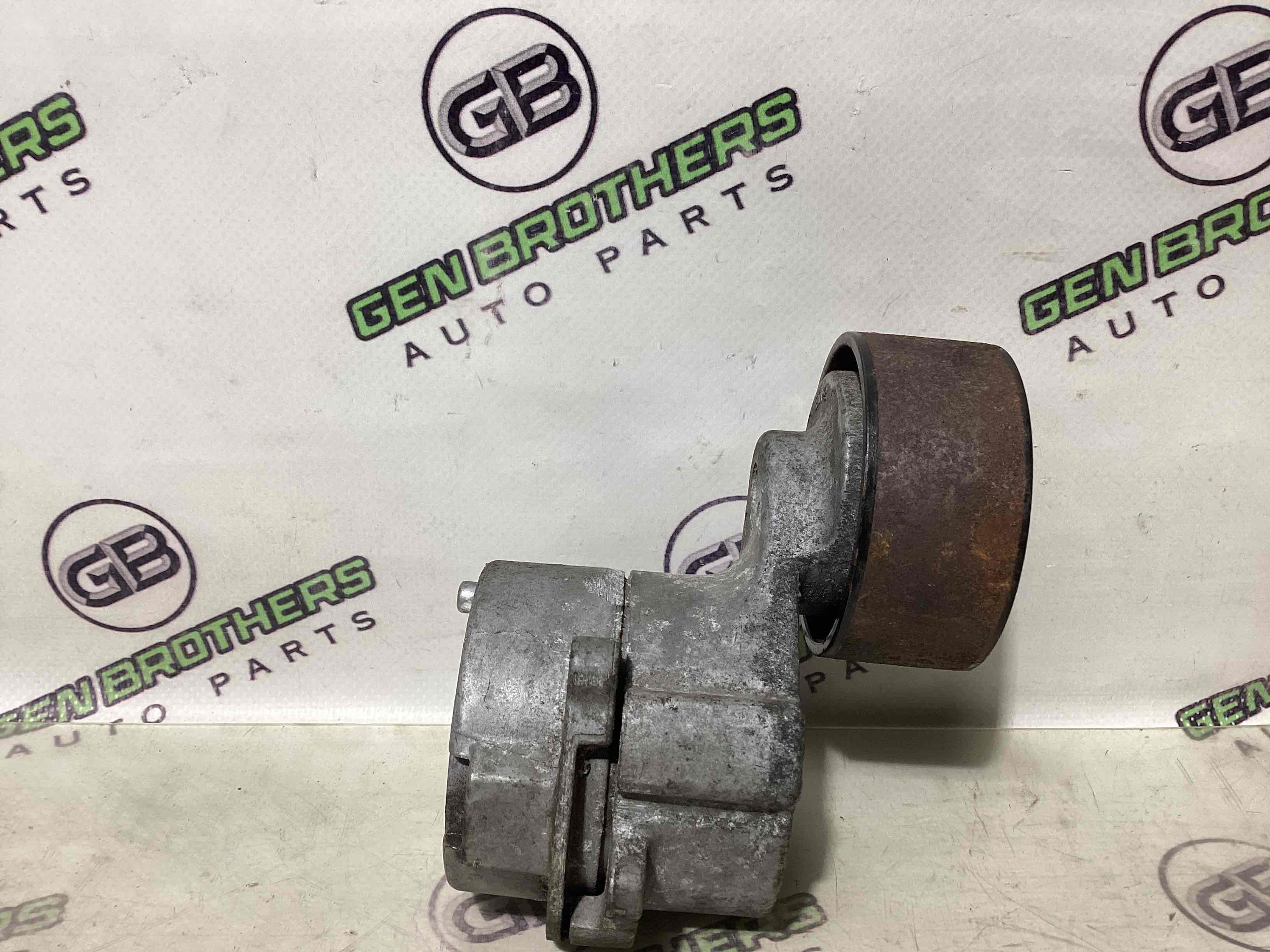 Механізм натягу ременя, ланцюга, ролика