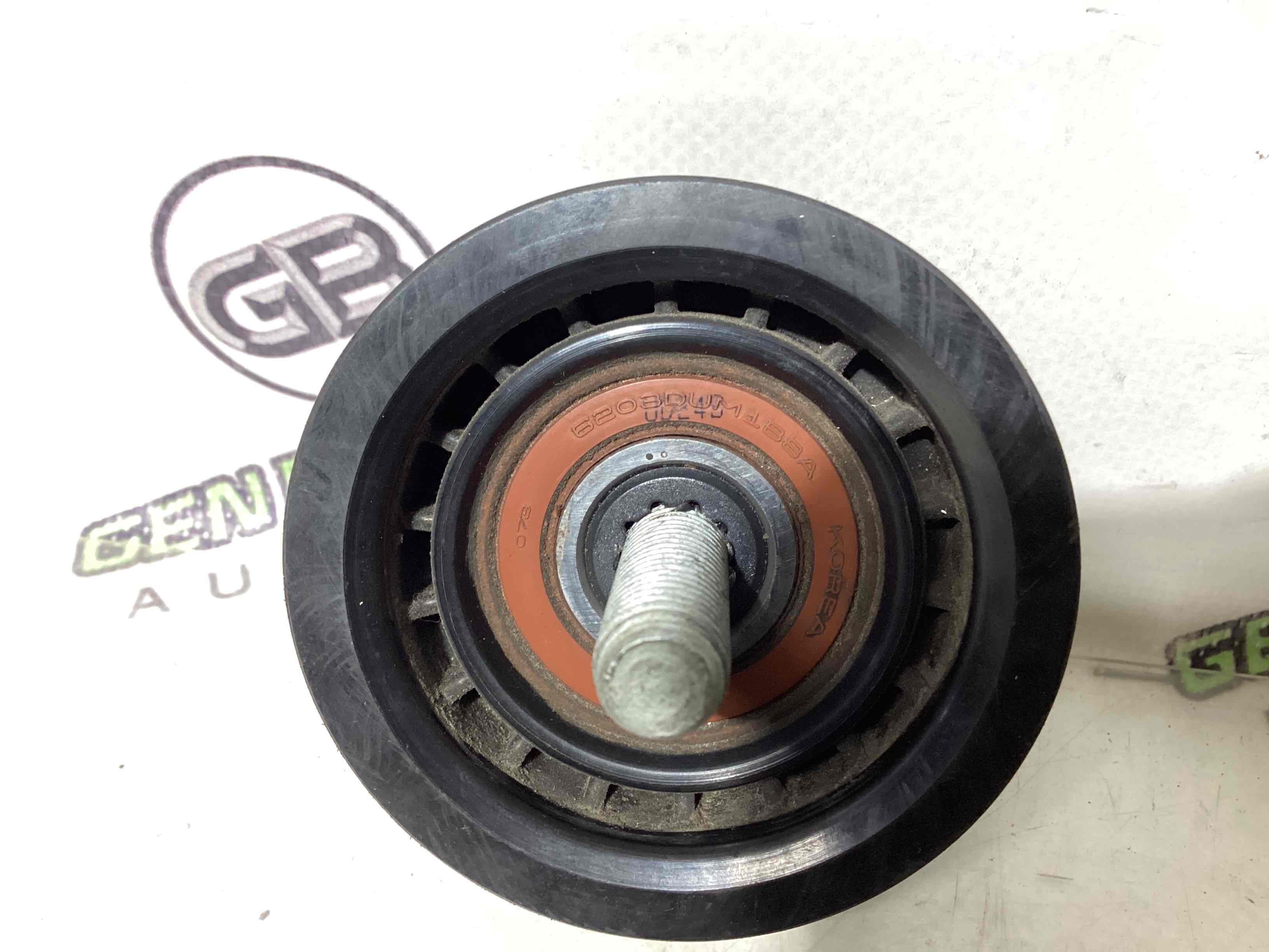 Механізм натягу ременя, ланцюга, ролика