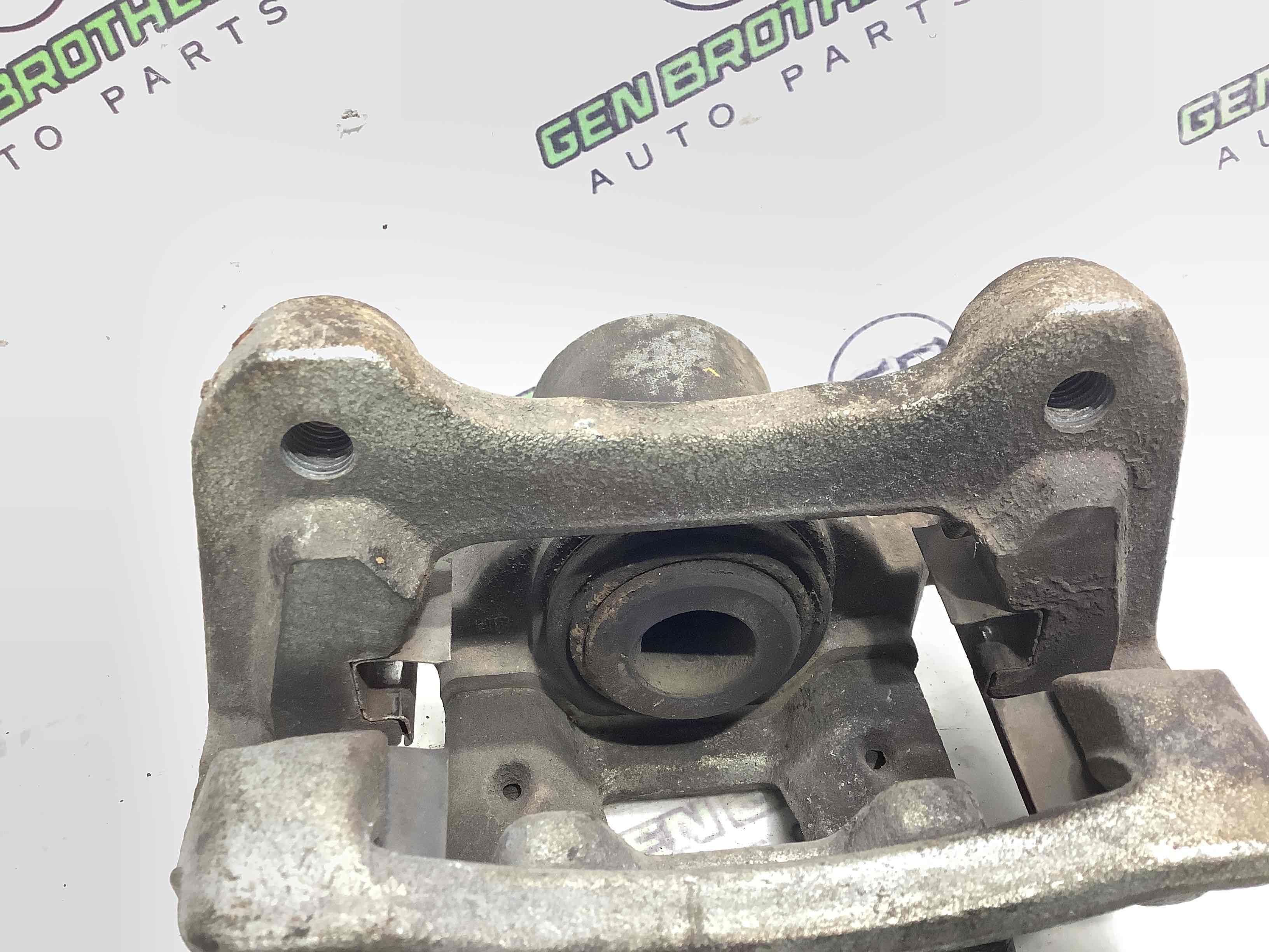 Супорт задній правий