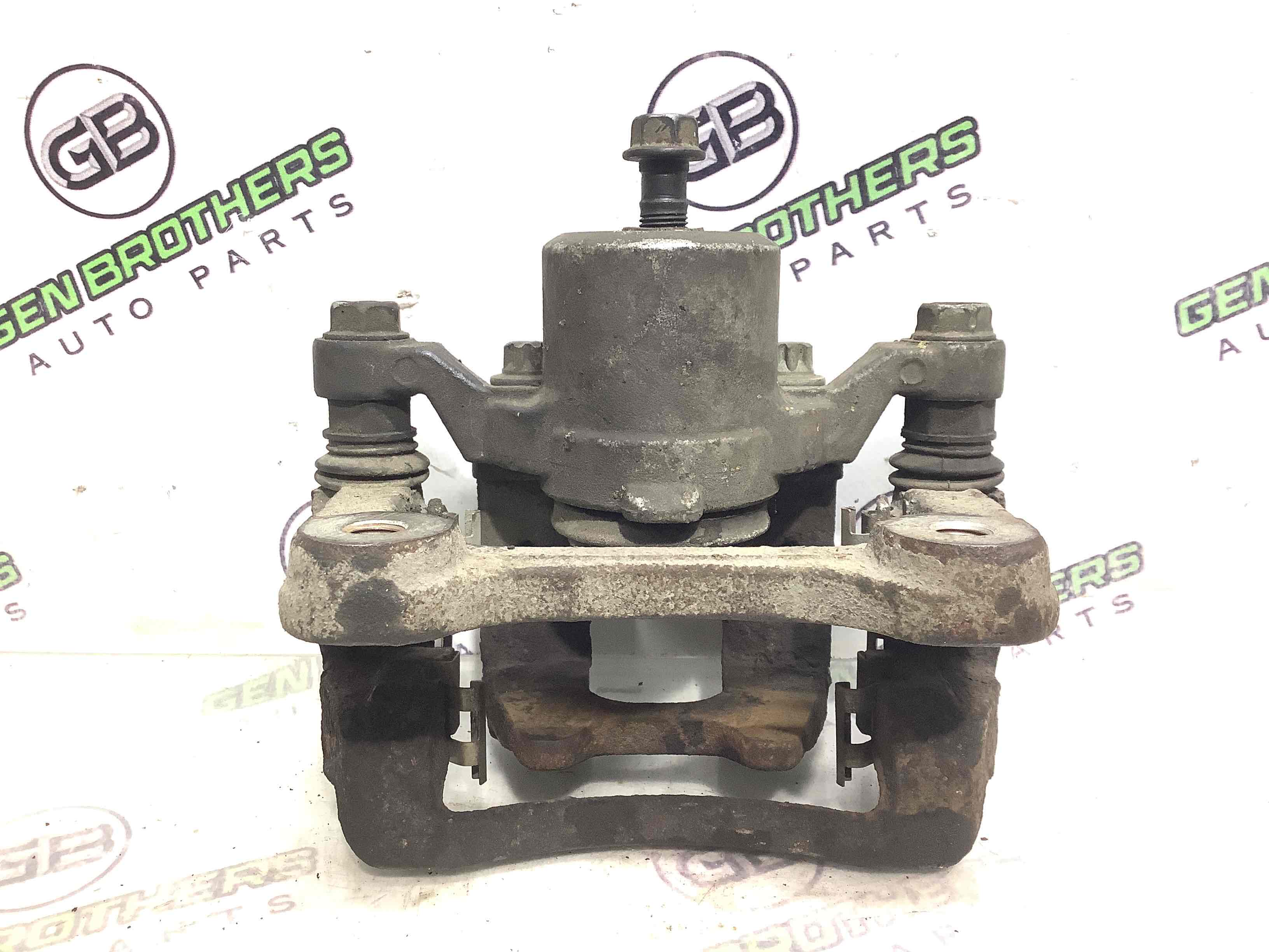 Супорт задній правий