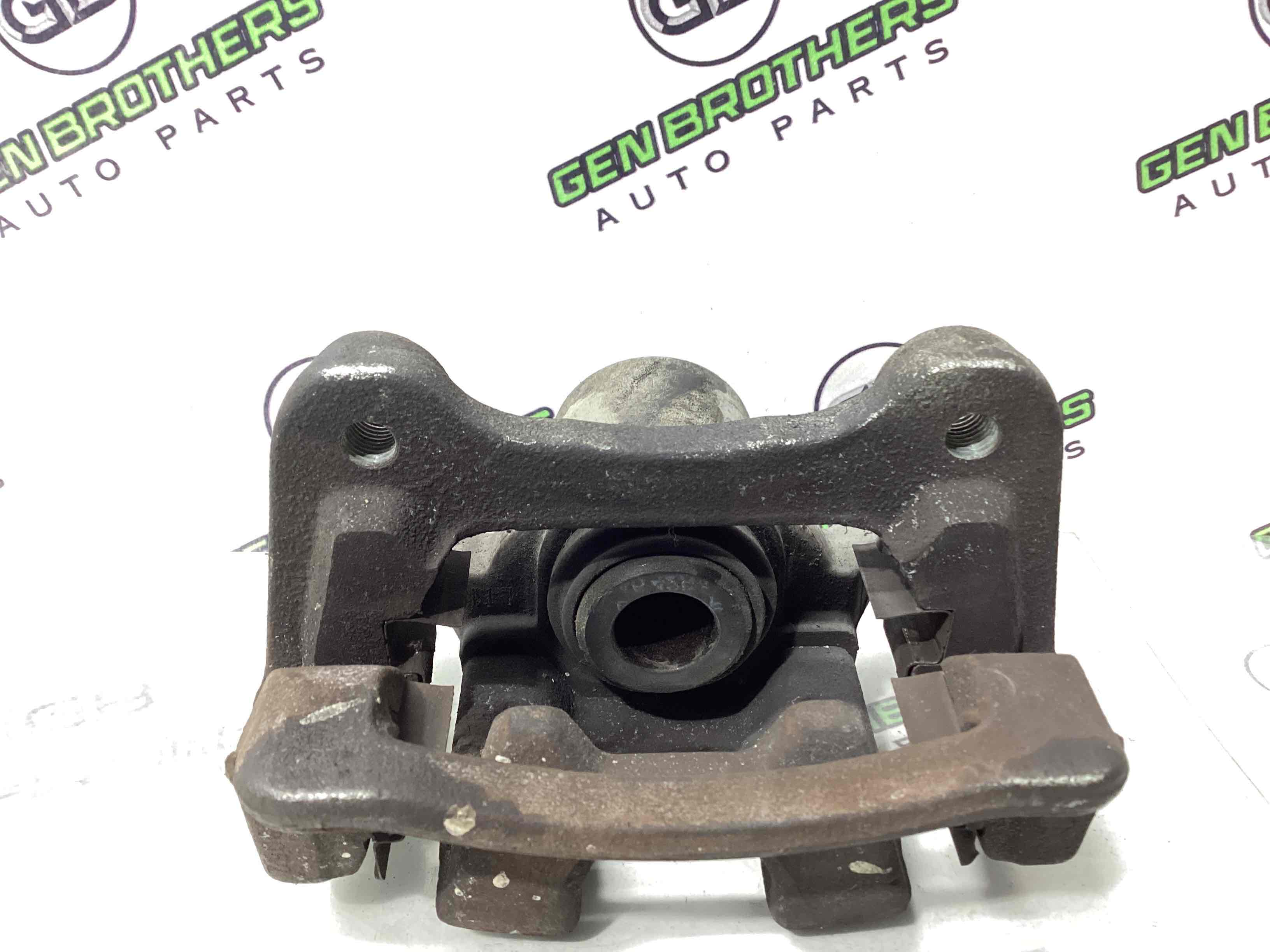 Супорт задній лівий