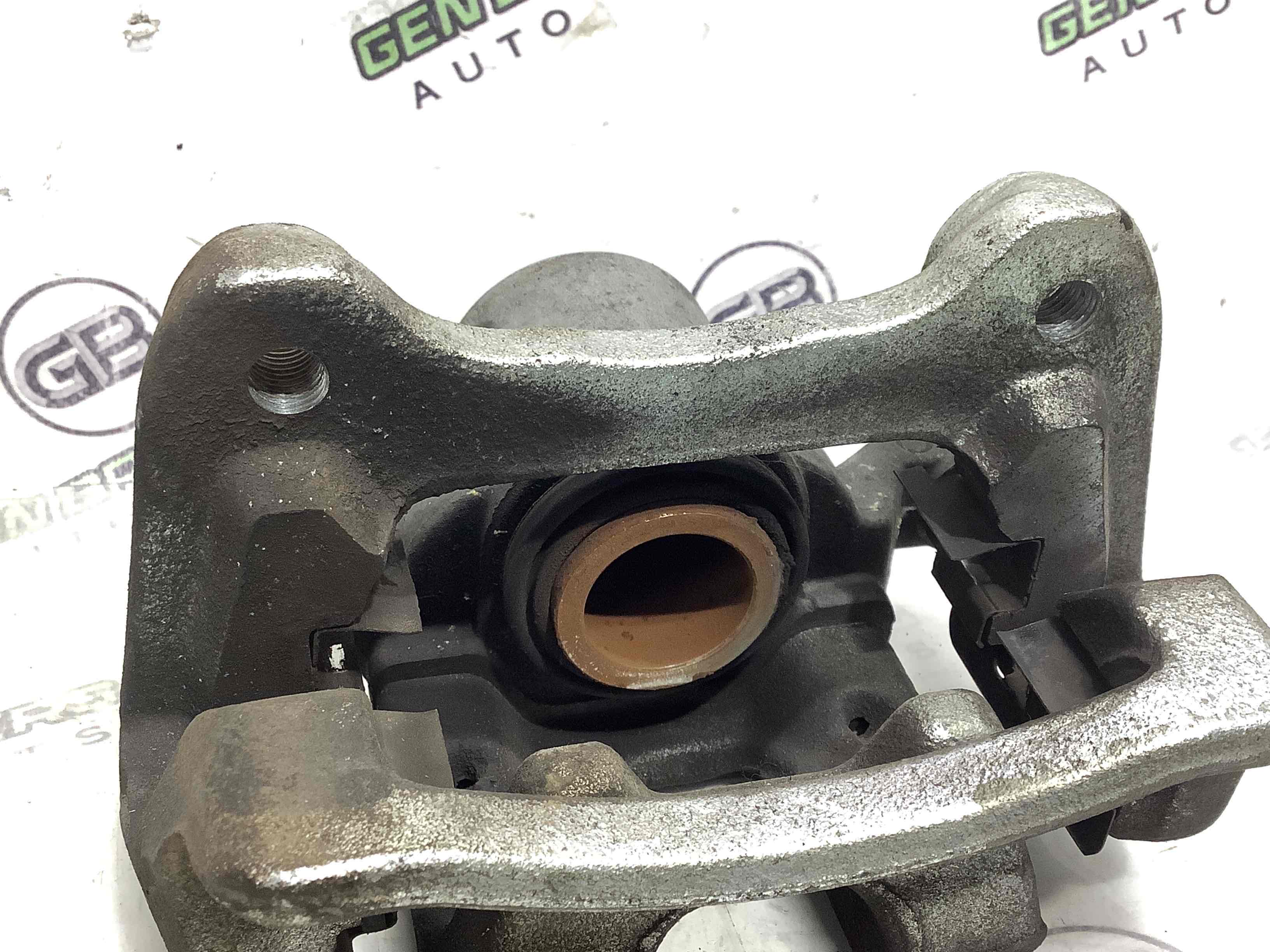 Супорт задній лівий