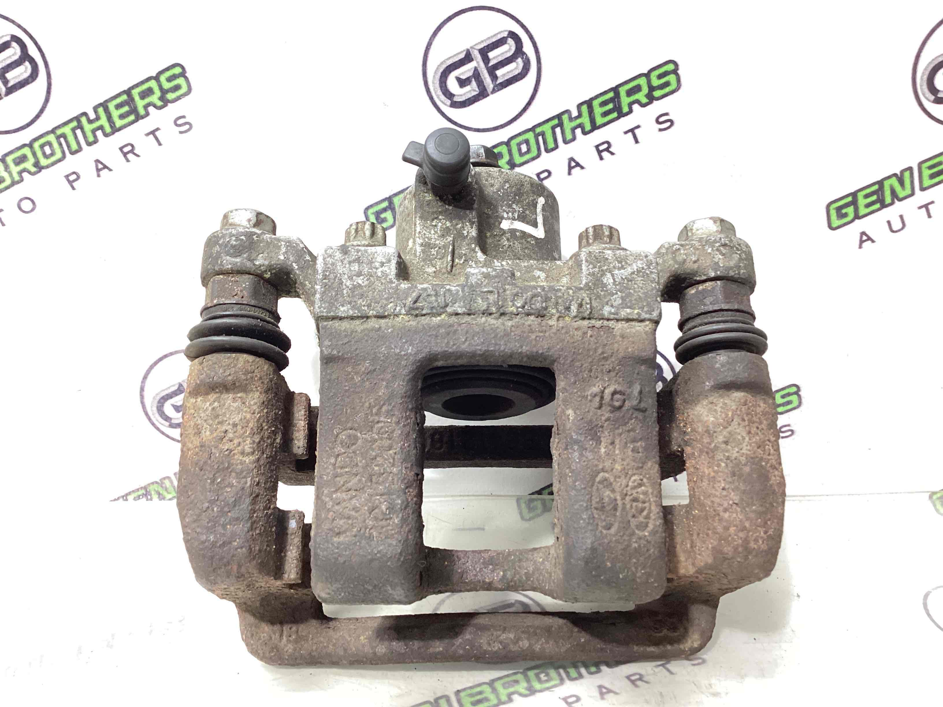 Супорт задній лівий