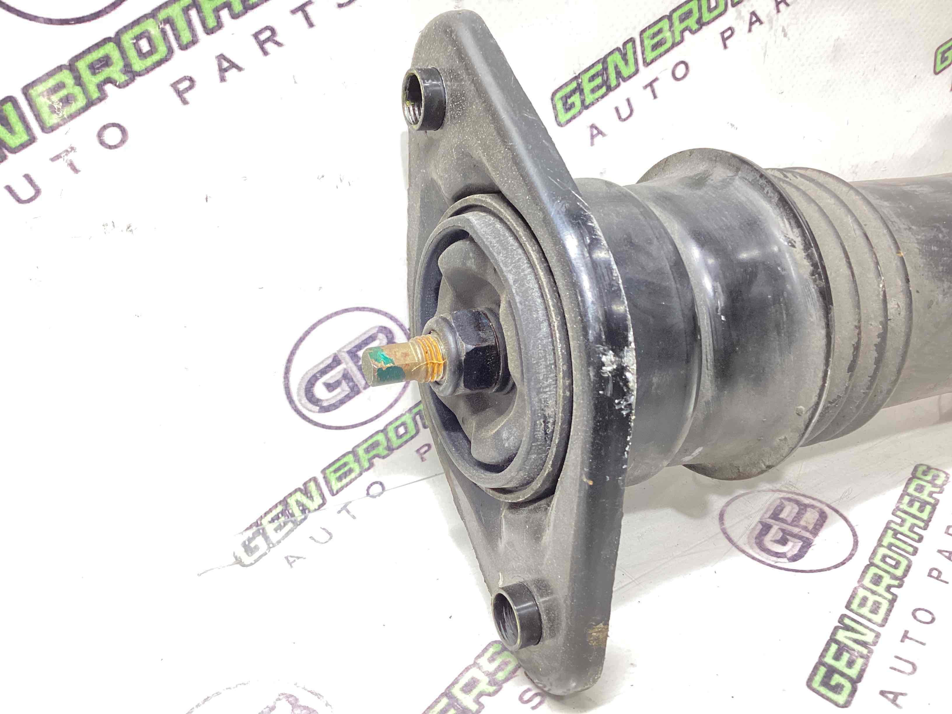 Амортизатор задній лівий