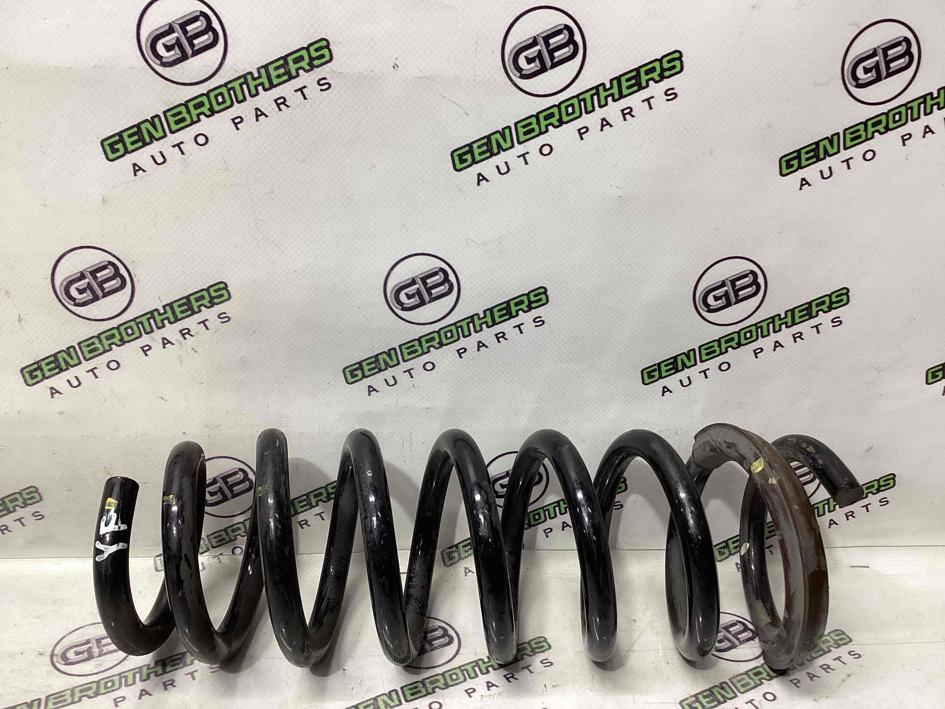 Пружина задня