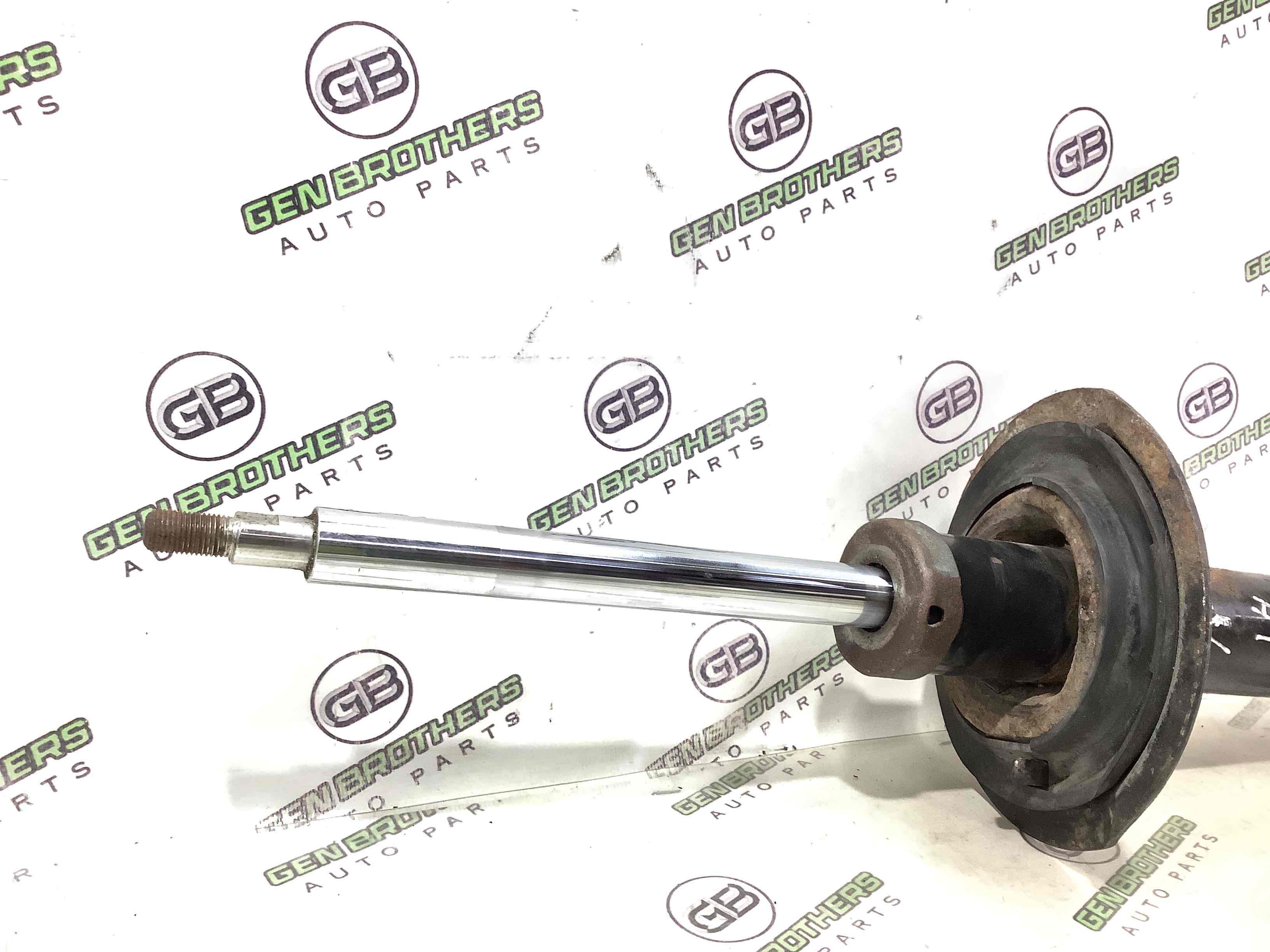 Амортизатор передній лівий