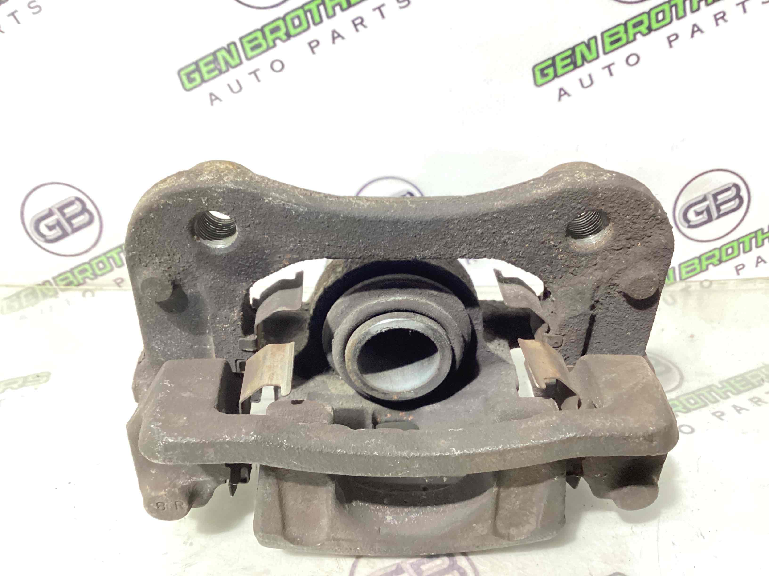 Супорт задній правий